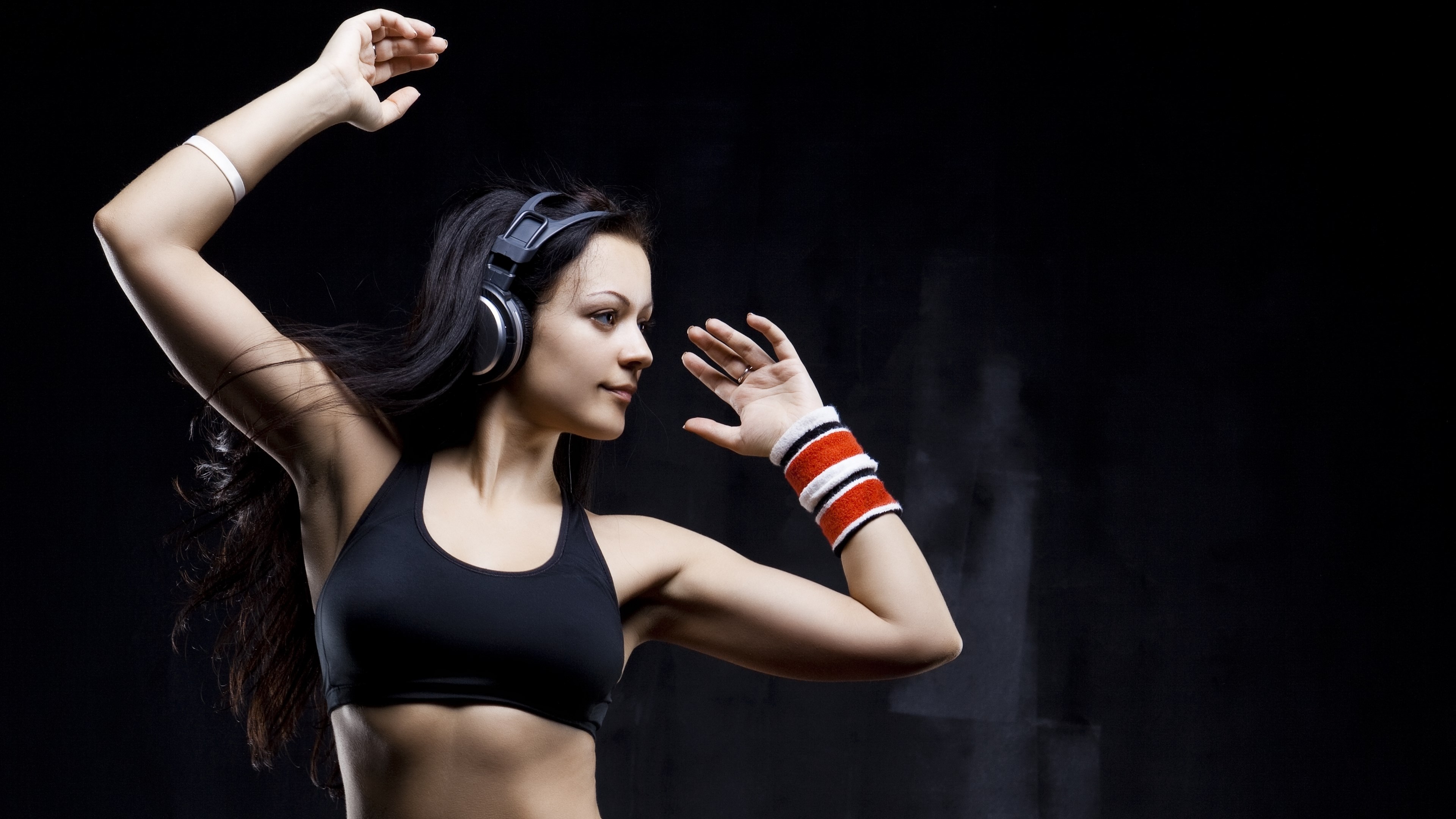 Woman with headphones dancing HD Wallpaper