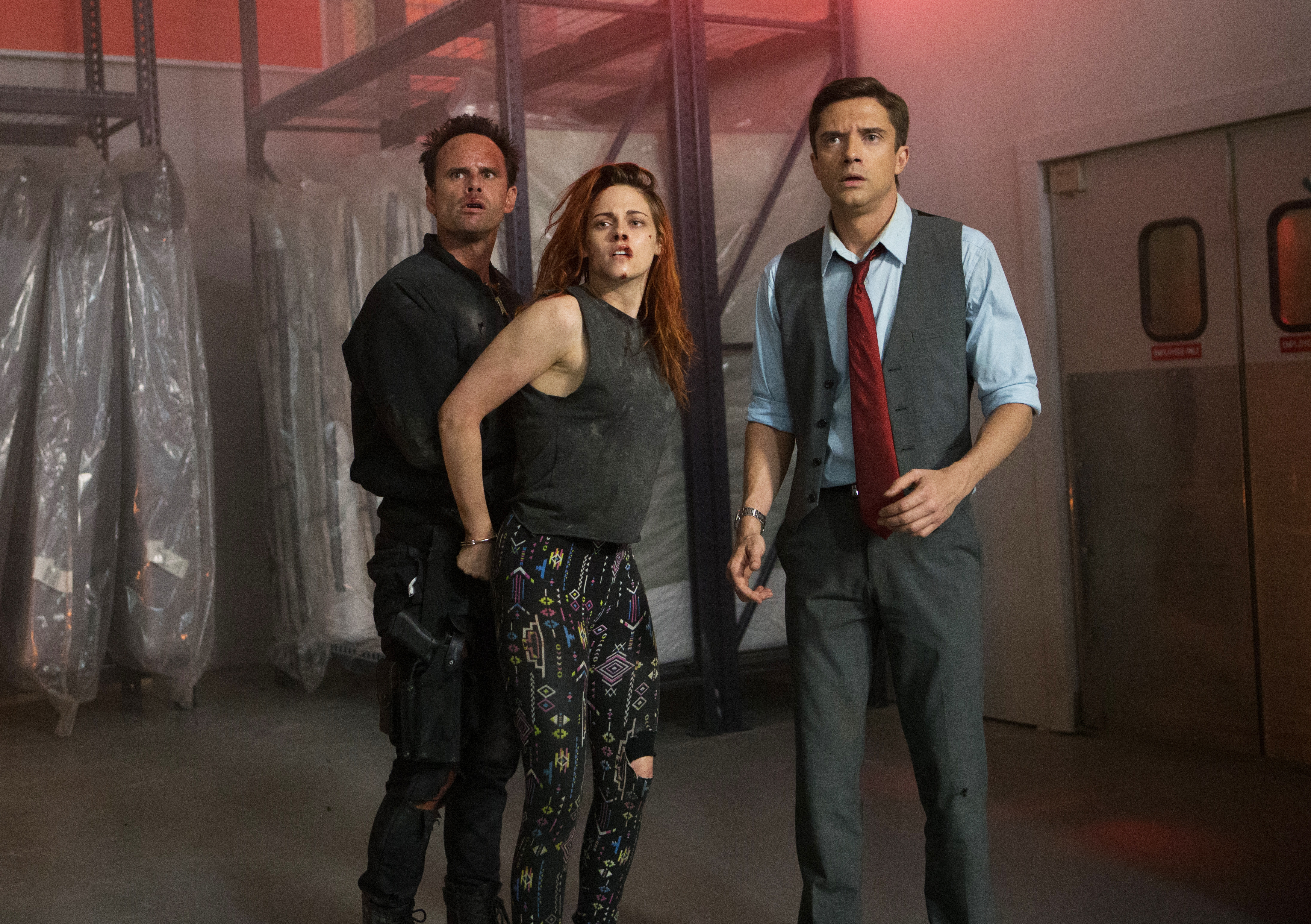 Walton Goggins, Kristen Stewart, and Jesse Eisenberg in a warehouse HD Wallpaper