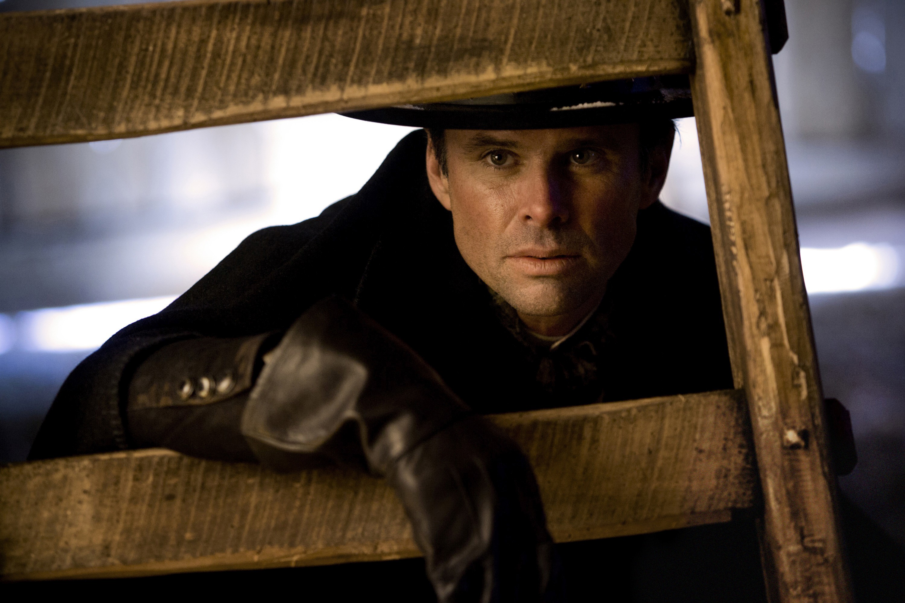 Walton Goggins in a dark coat and hat HD Wallpaper