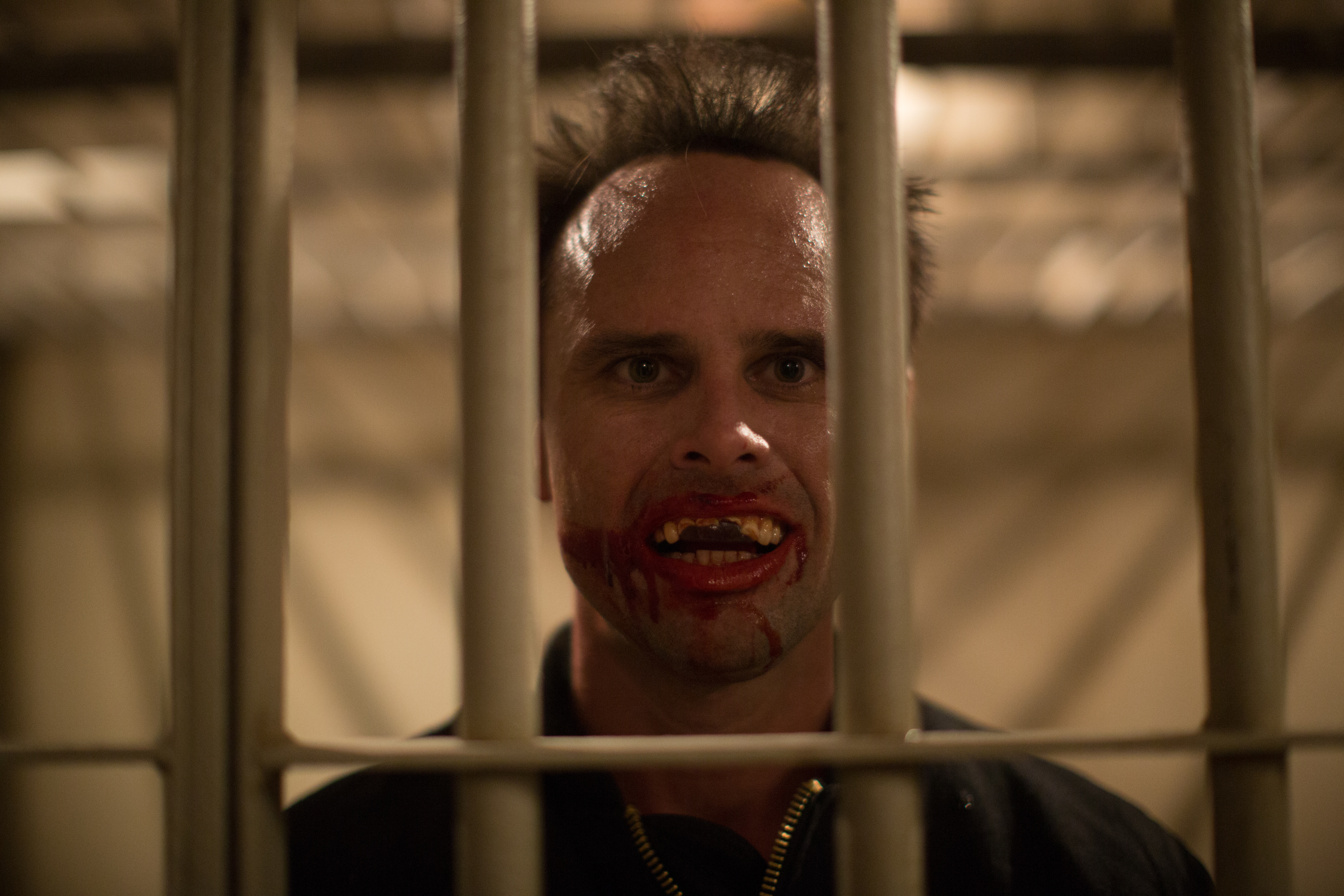 Walton Goggins behind prison bars HD Wallpaper