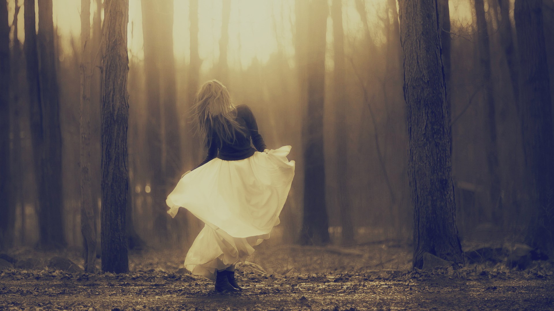 Woman dancing in a misty forest HD Wallpaper
