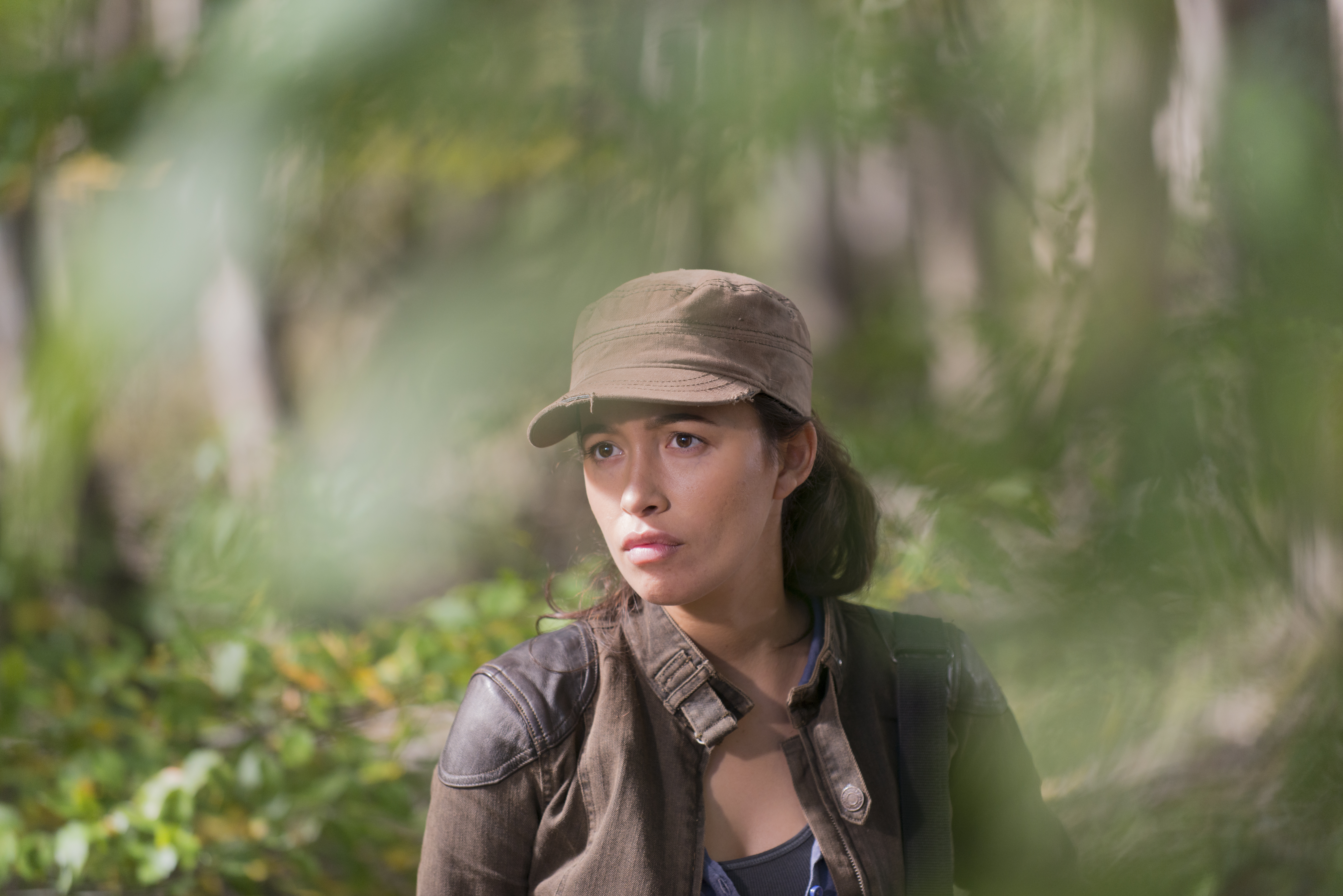 Christian Serratos in a forest HD Wallpaper