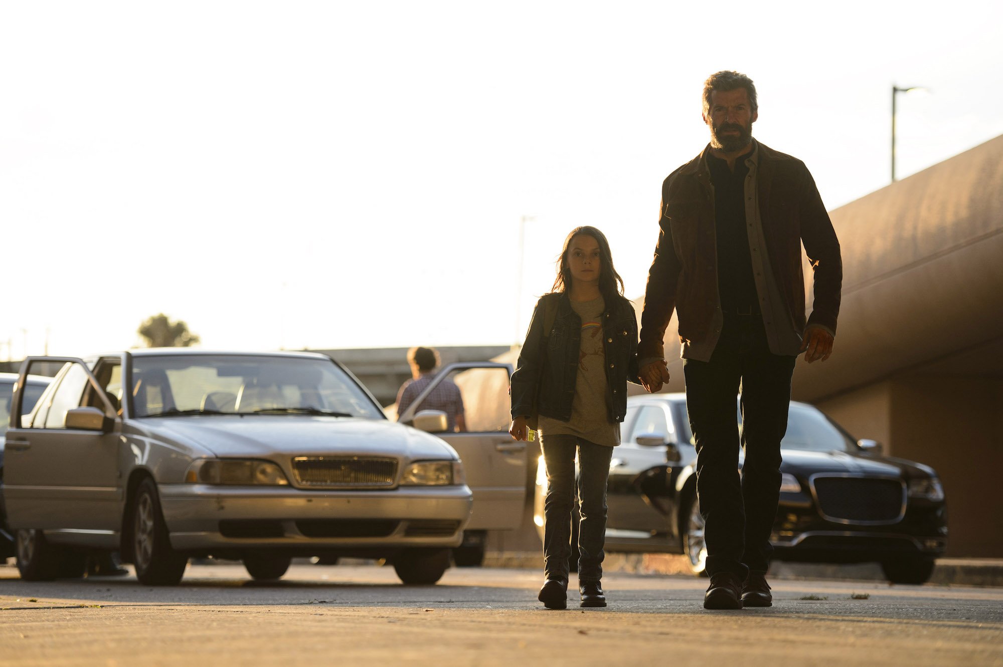 Logan and Dafne Keen walking HD Wallpaper