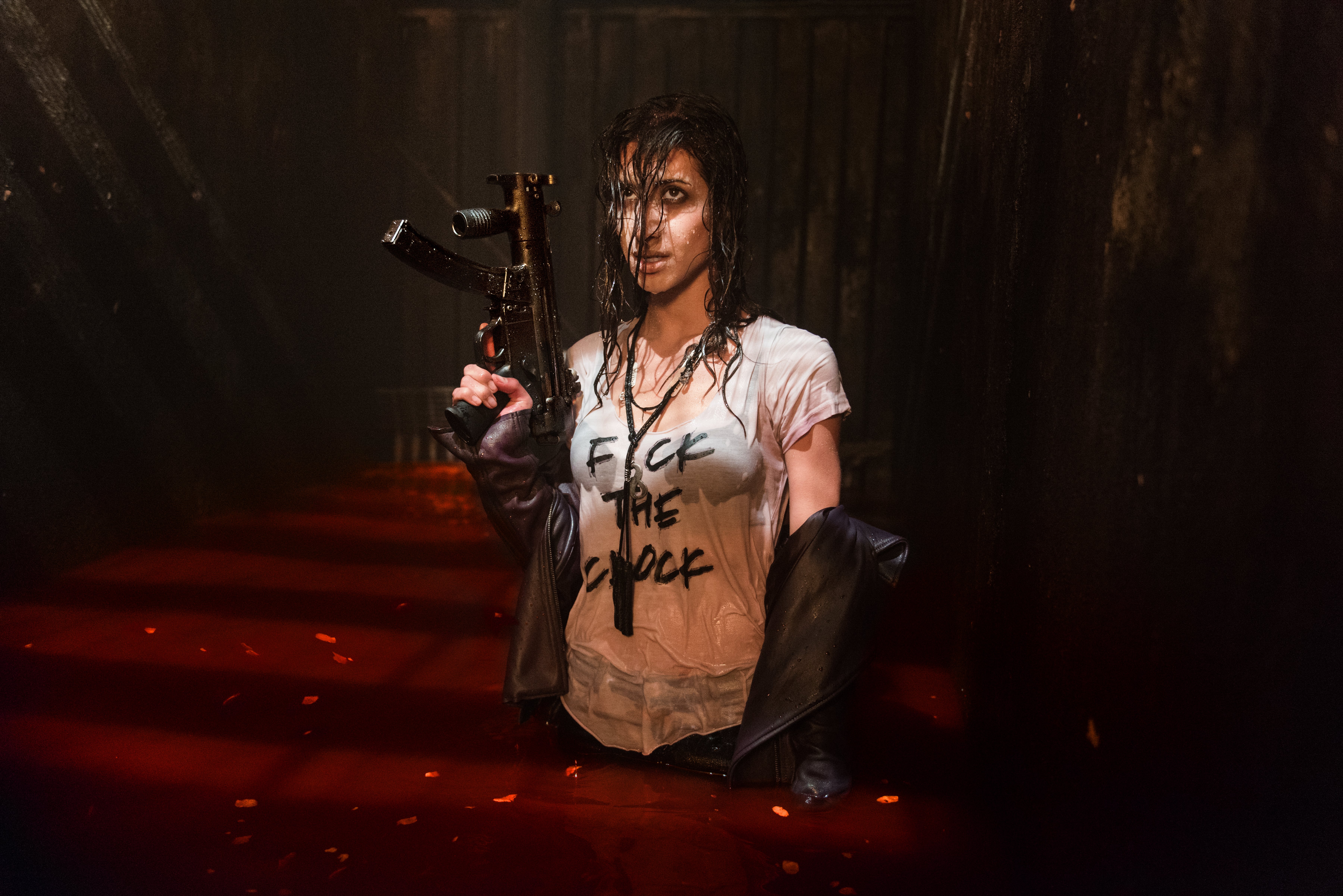 Dana DeLorenzo holding a gun in red liquid HD Wallpaper