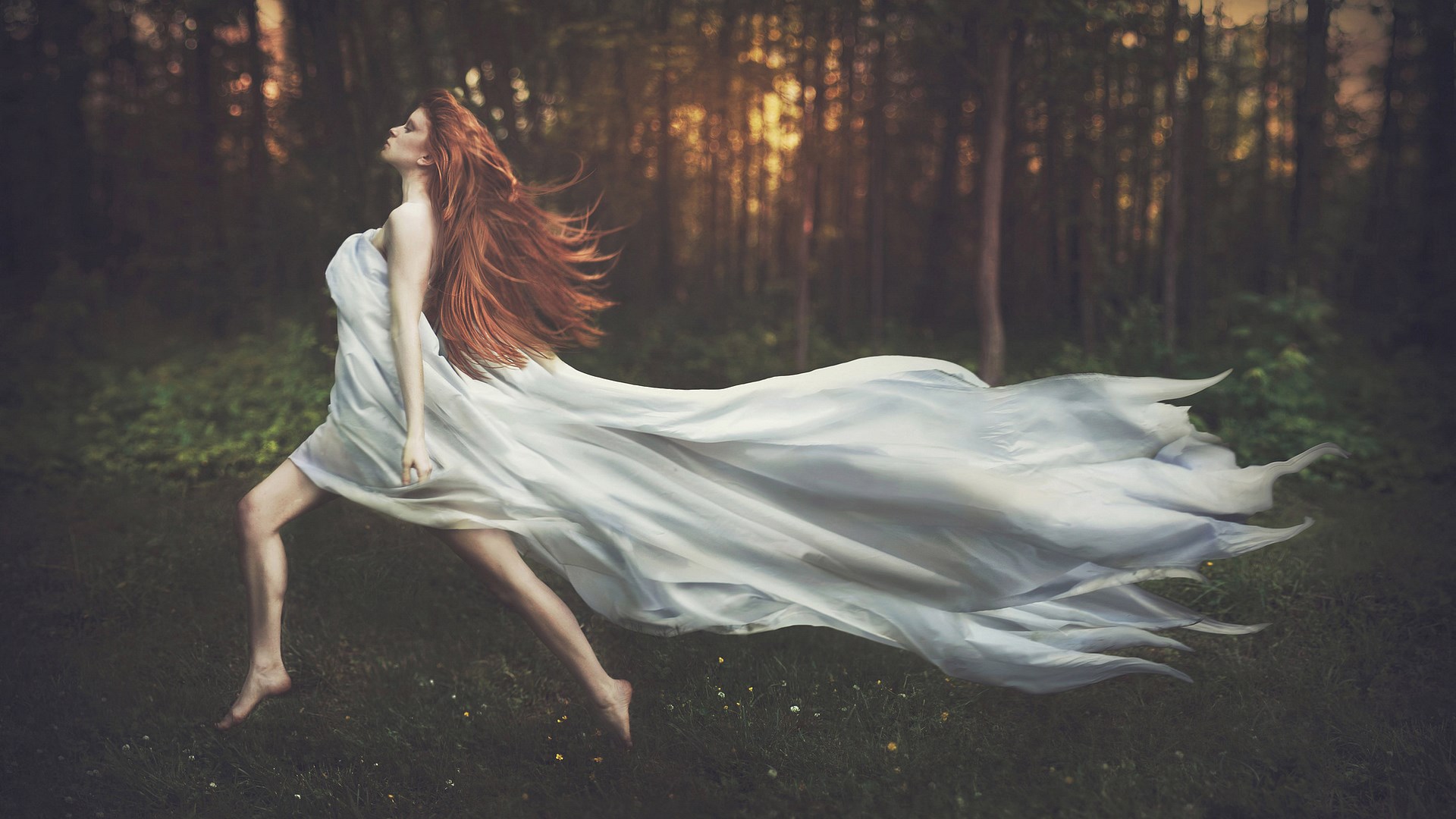 Woman in white dress running through a forest HD Wallpaper