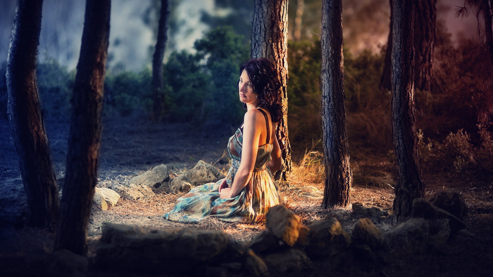Woman in a dress sitting in a forest HD Wallpaper