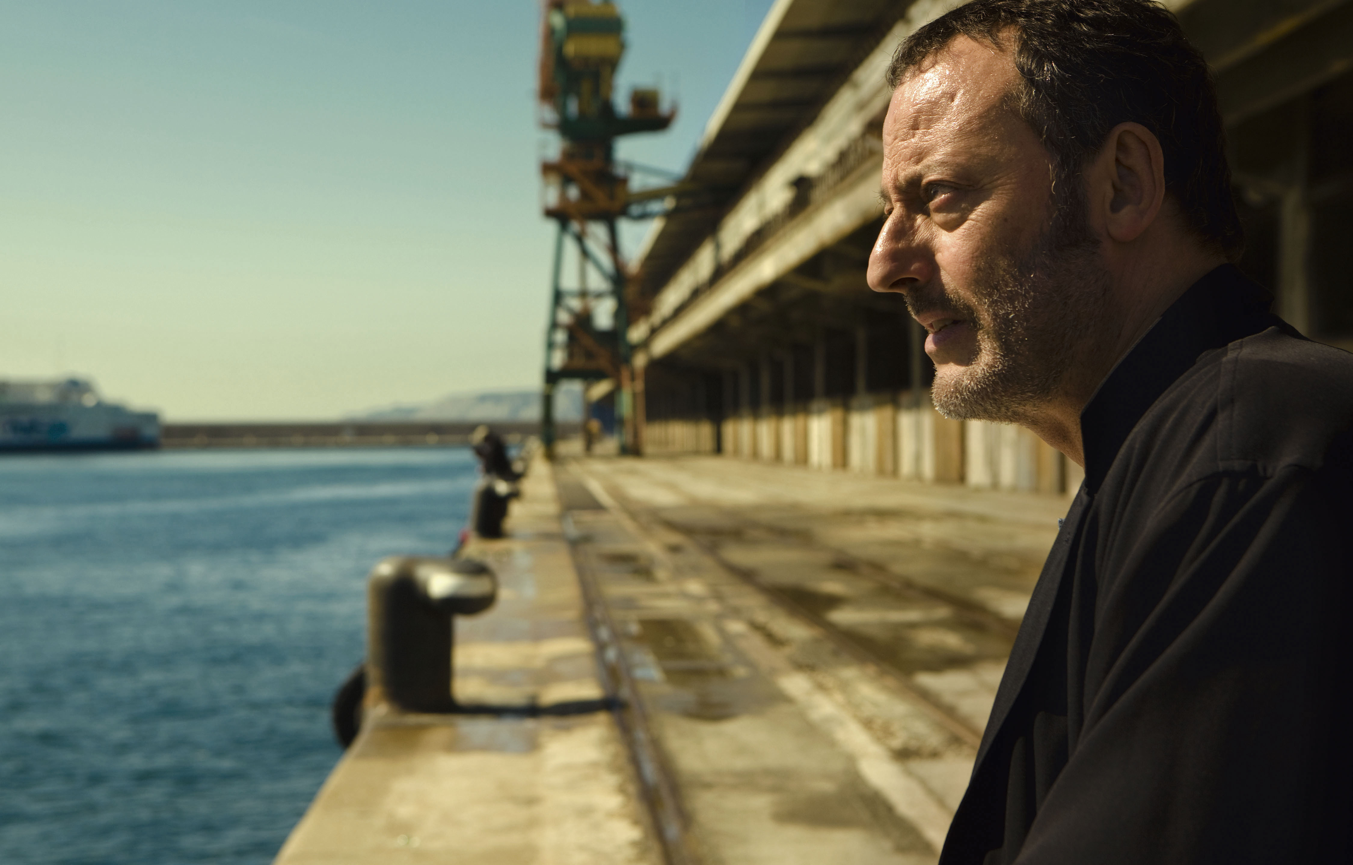 Jean Reno on a dock HD Wallpaper