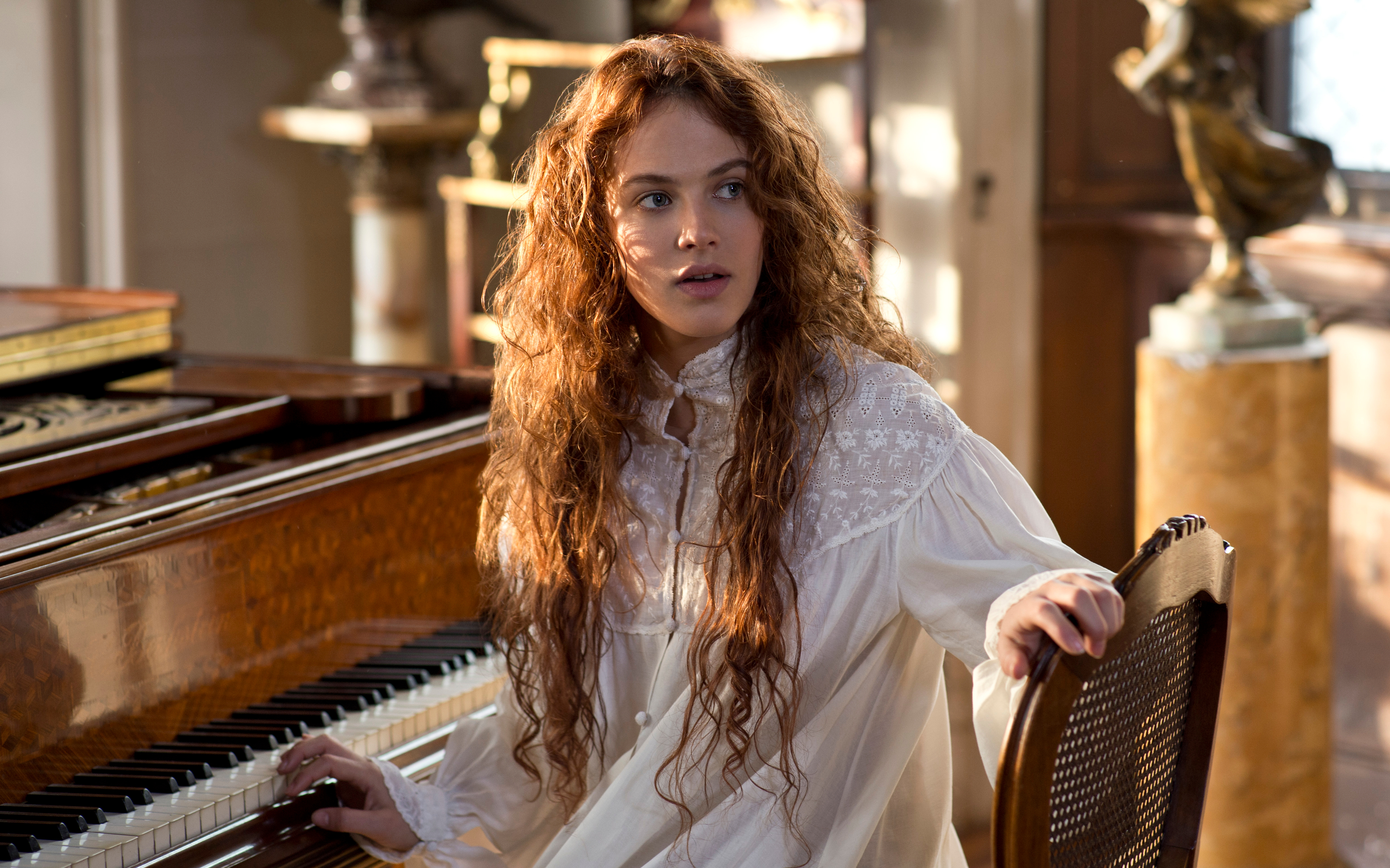 Jessica Brown Findlay at a piano HD Wallpaper