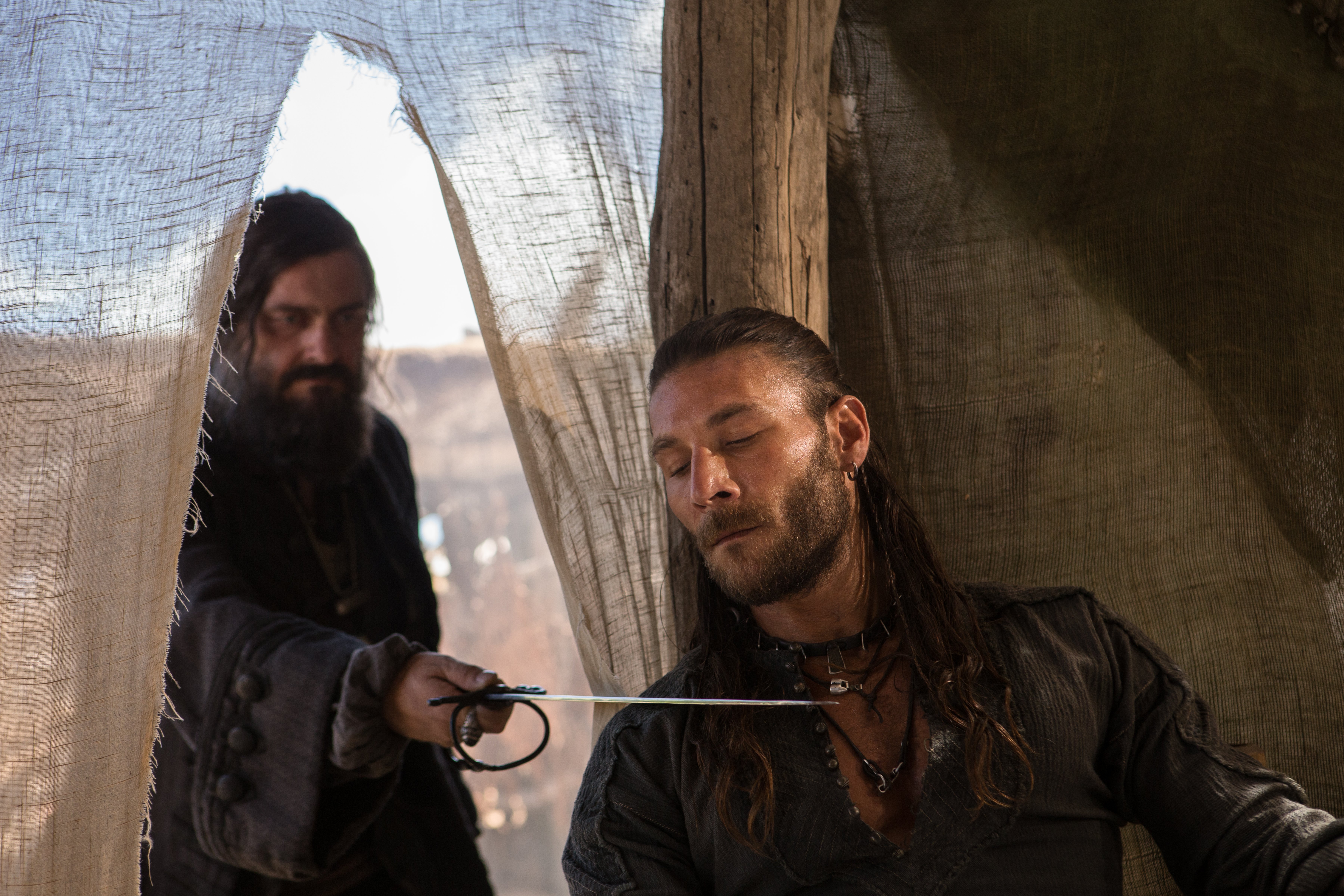 Ray Stevenson in a tent with a sword HD Wallpaper