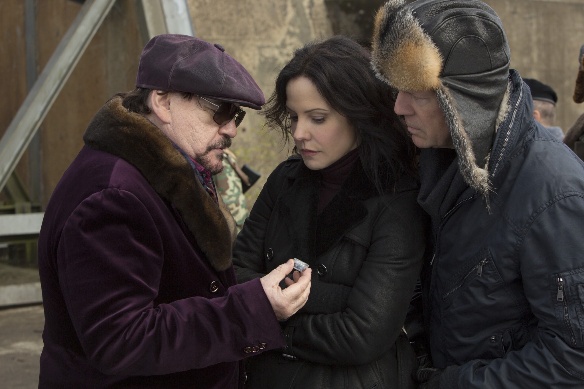 Sarah Ross and two men examining an object HD Wallpaper
