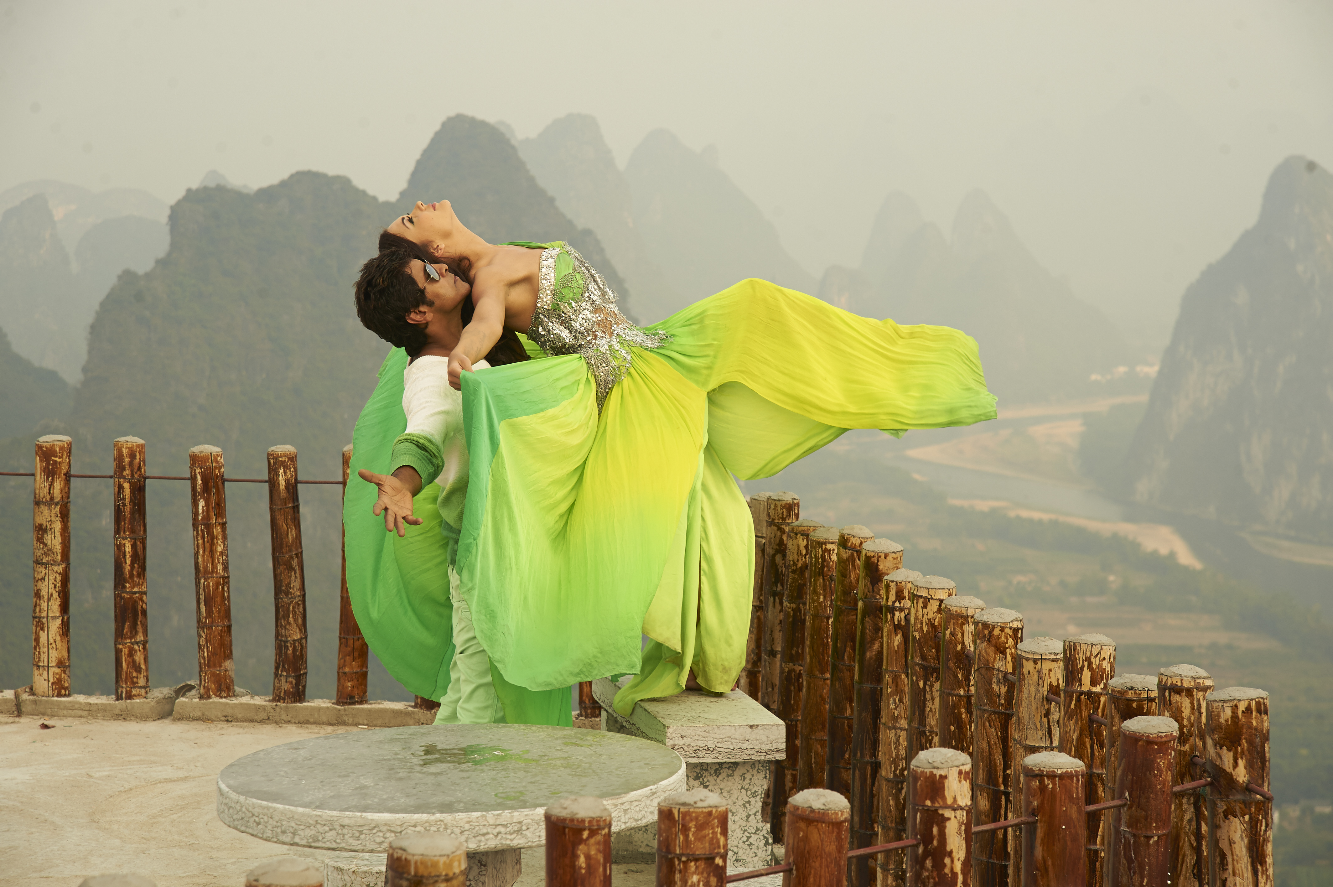 Amy Jackson dancing on a mountain viewpoint HD Wallpaper