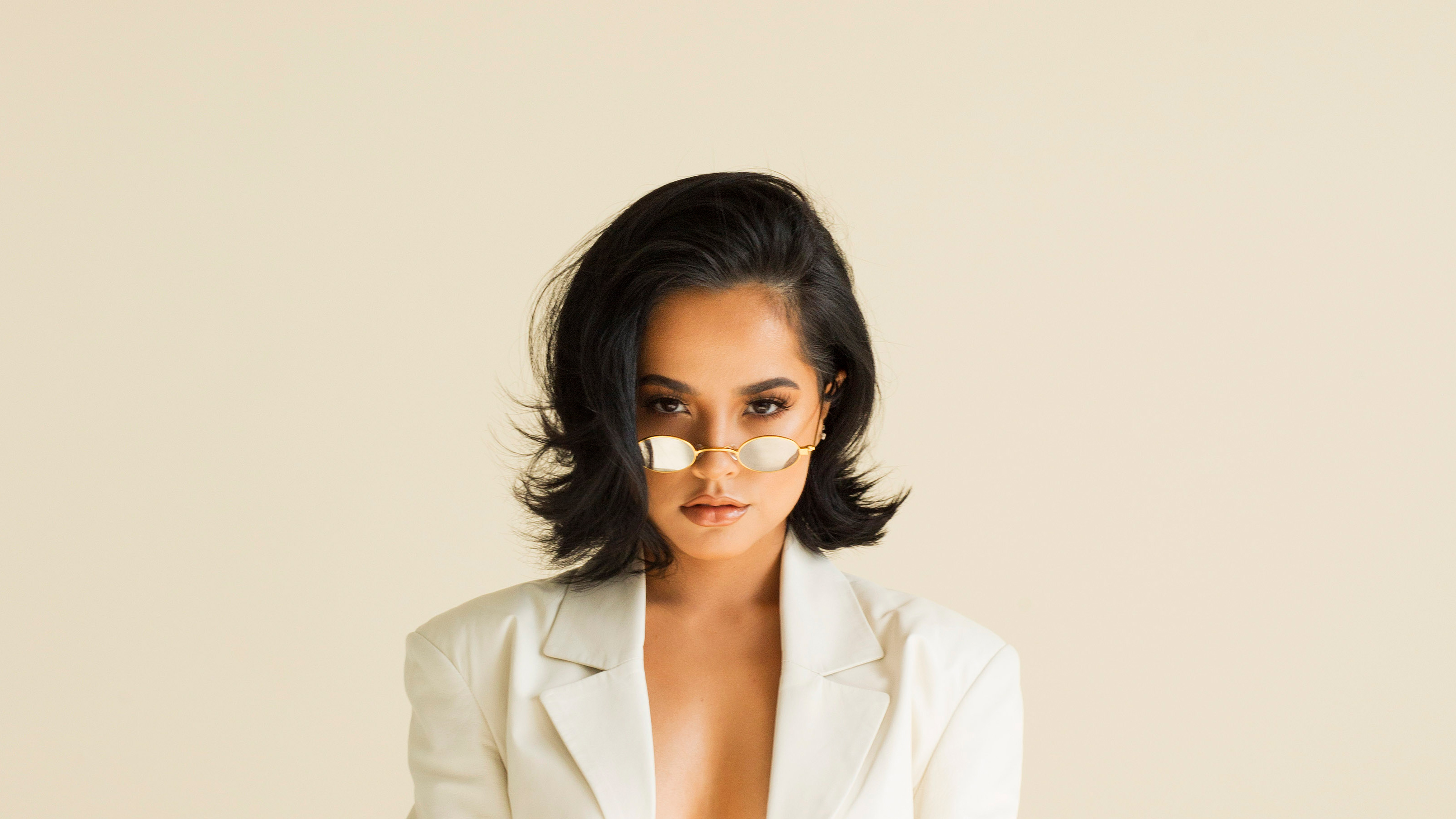 Becky G wearing a white blazer and sunglasses HD Wallpaper