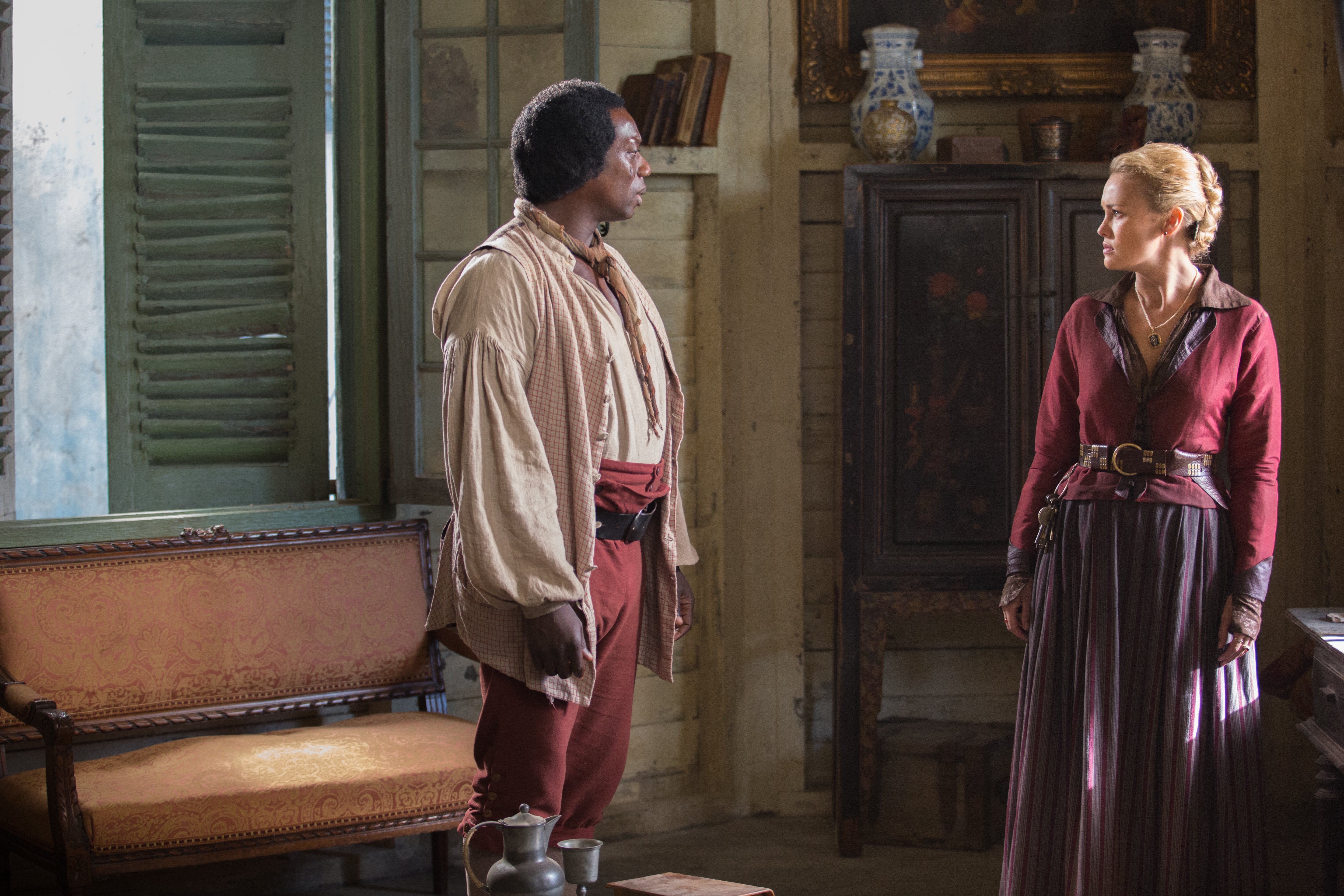 Hakeem Kae-Kazim and woman in period costumes HD Wallpaper
