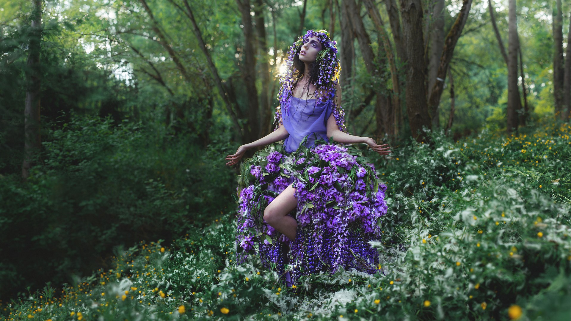 Woman in a floral dress in a forest HD Wallpaper