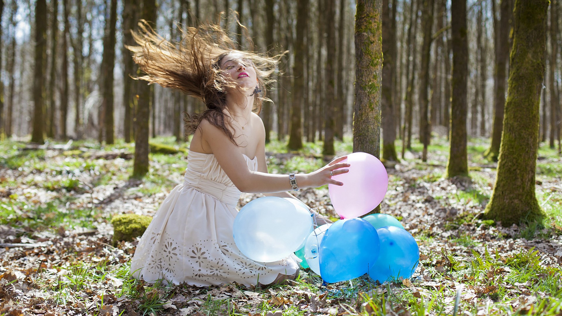 Woman with balloons in a forest HD Wallpaper