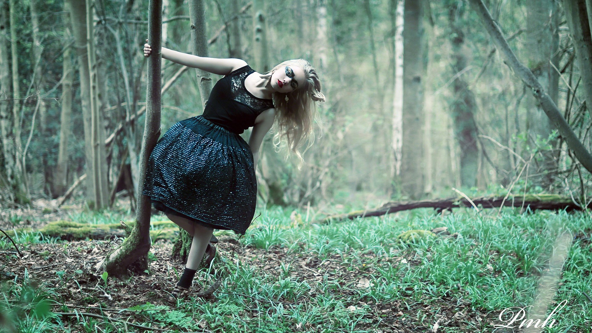 Woman in black dress in a forest HD Wallpaper