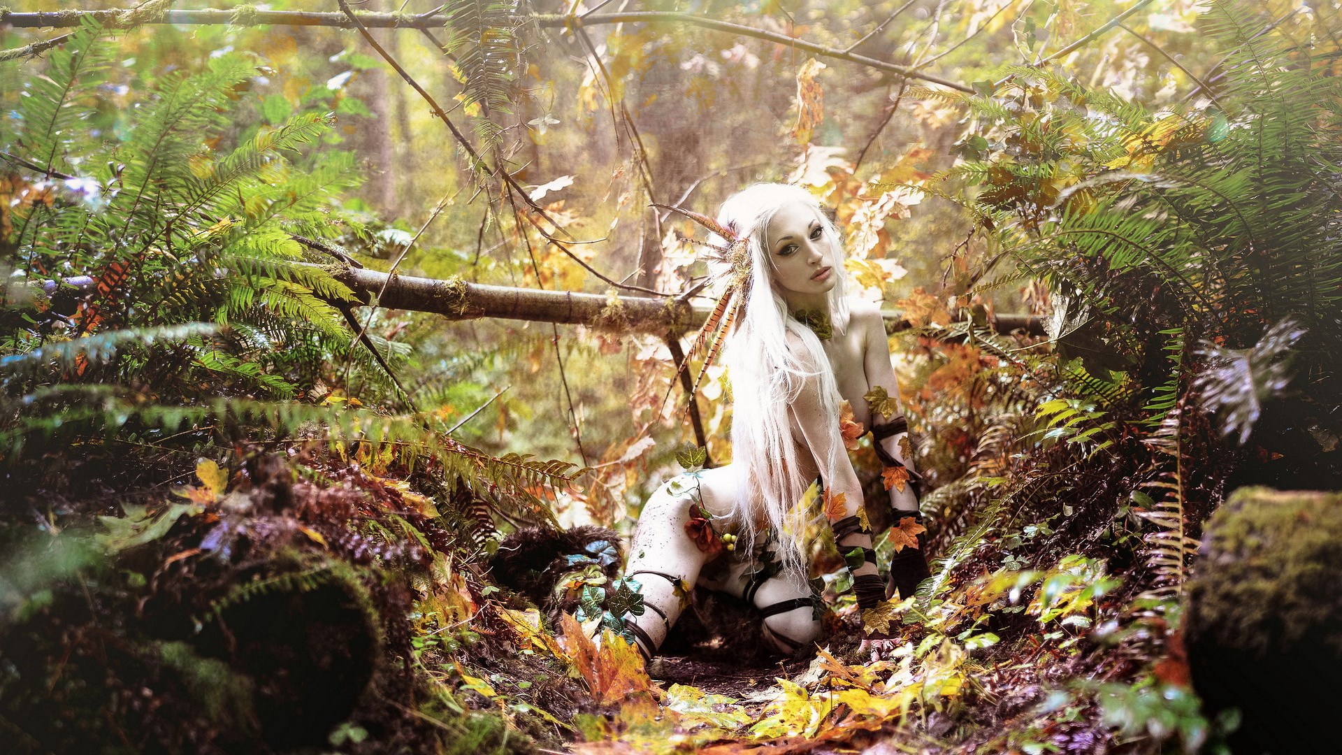 Woman in forest with leaves and ferns HD Wallpaper