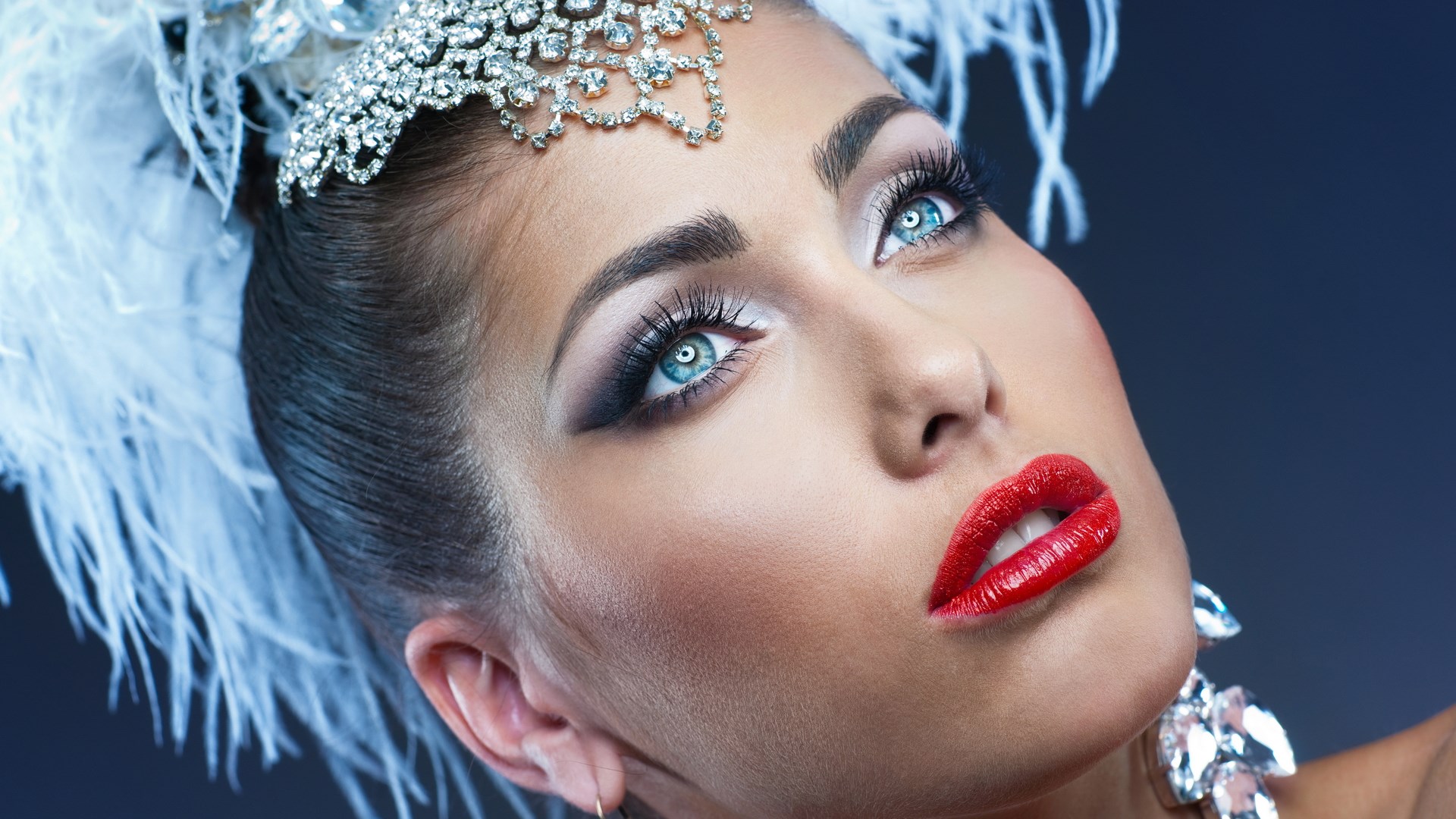 Woman with elaborate makeup and headdress HD Wallpaper