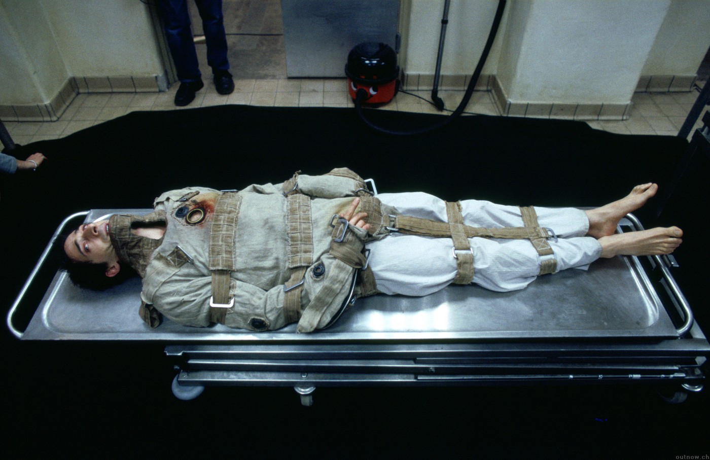 Adrien Brody in a straitjacket on a gurney HD Wallpaper