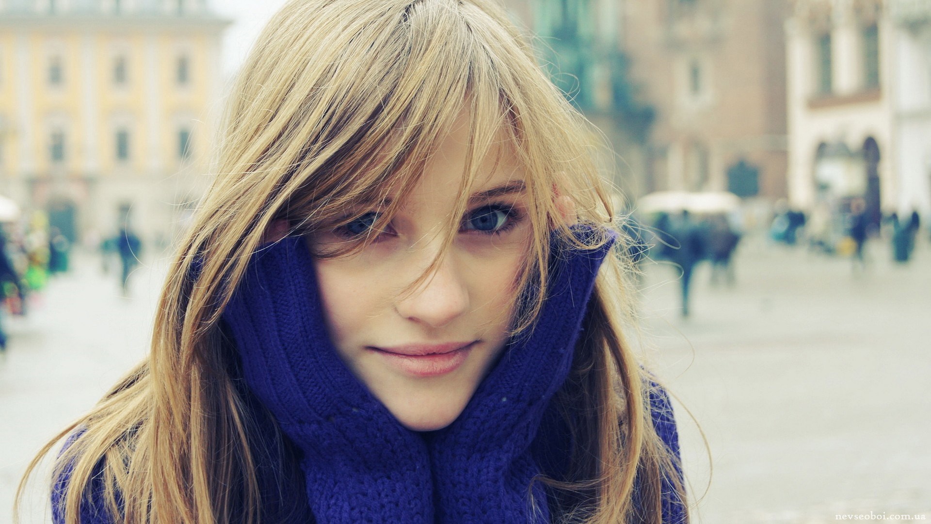 Young woman with blonde hair and blue eyes HD Wallpaper