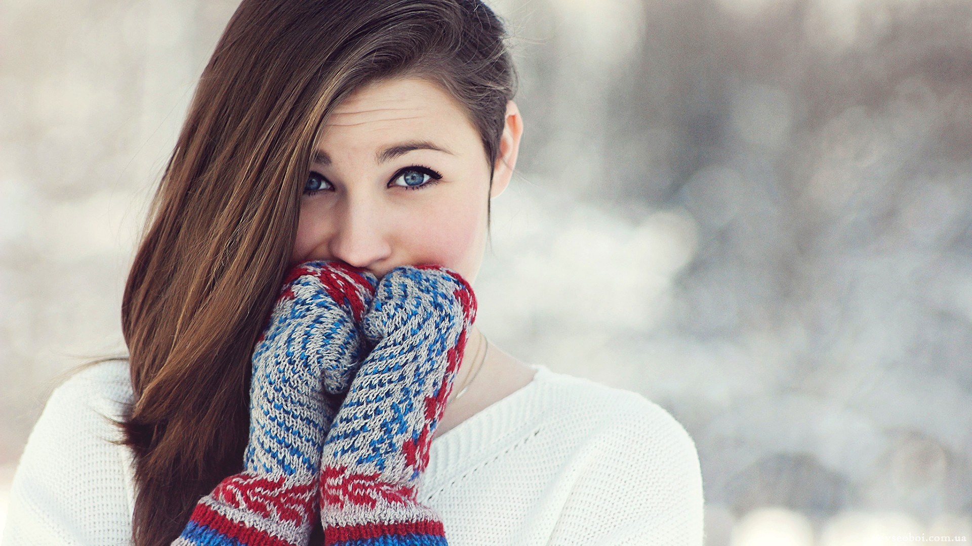 Young woman wearing mittens and a white sweater HD Wallpaper