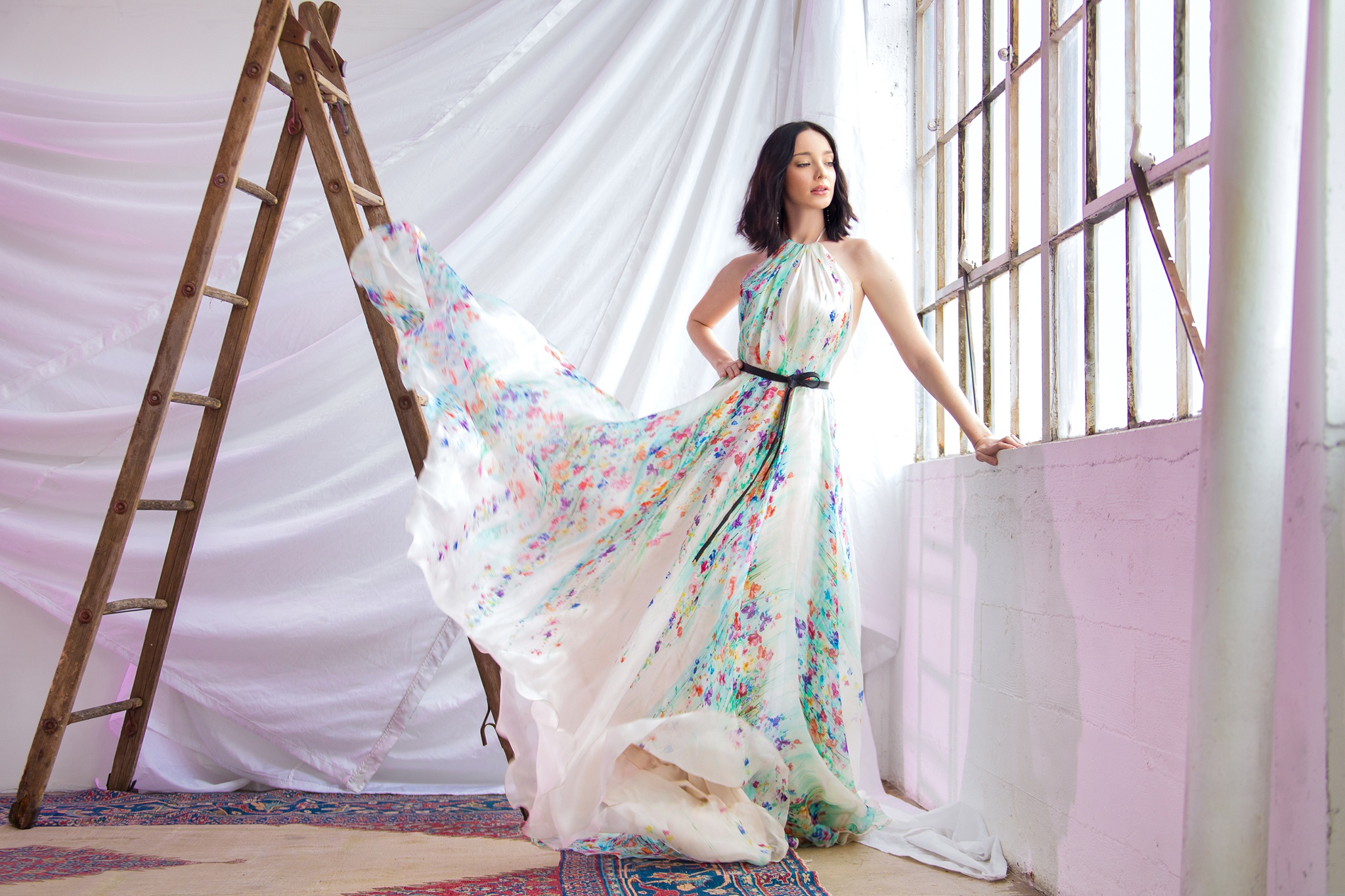 Emma Dumont in a floral dress HD Wallpaper
