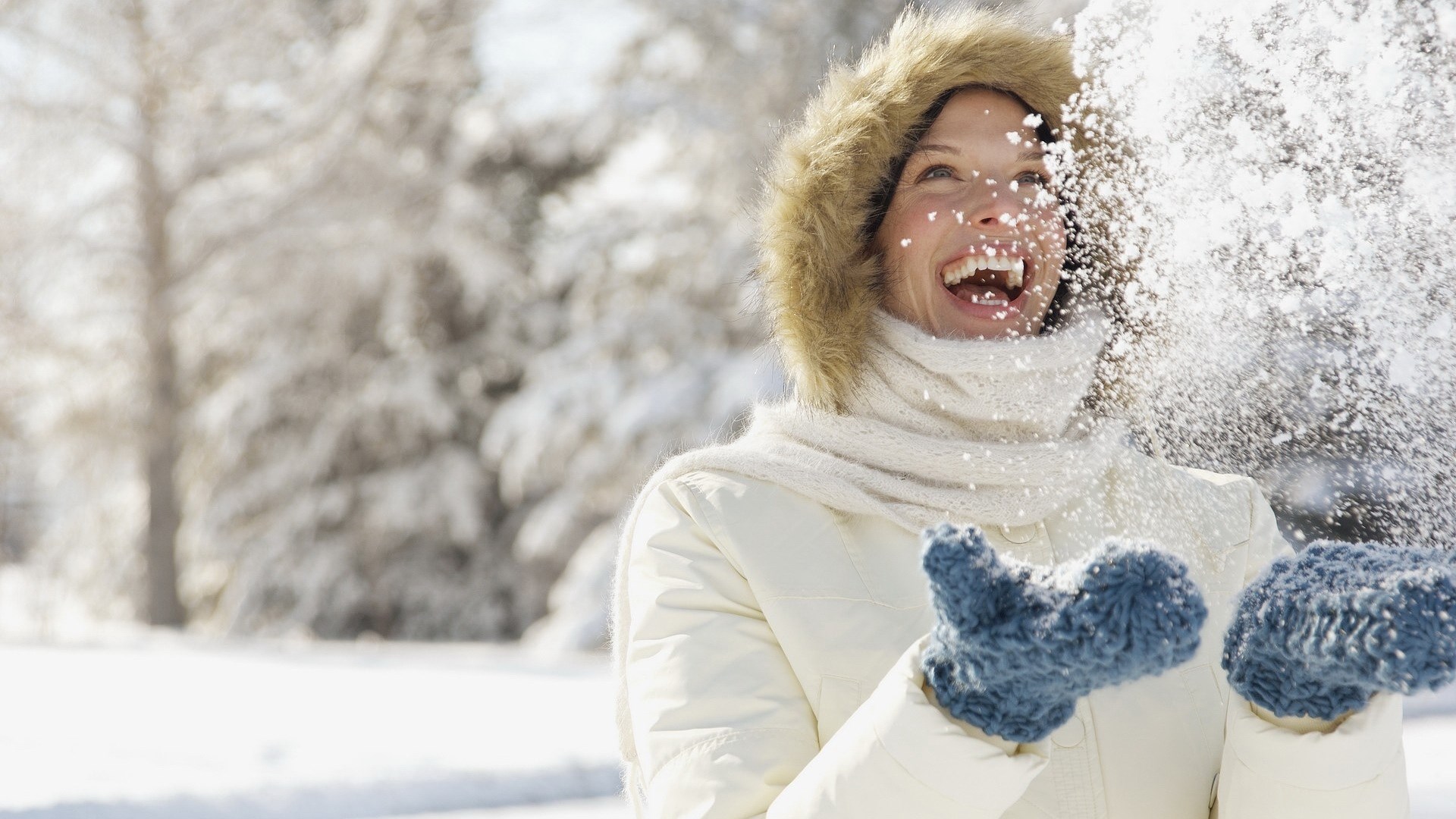 Woman throwing snow in the air HD Wallpaper