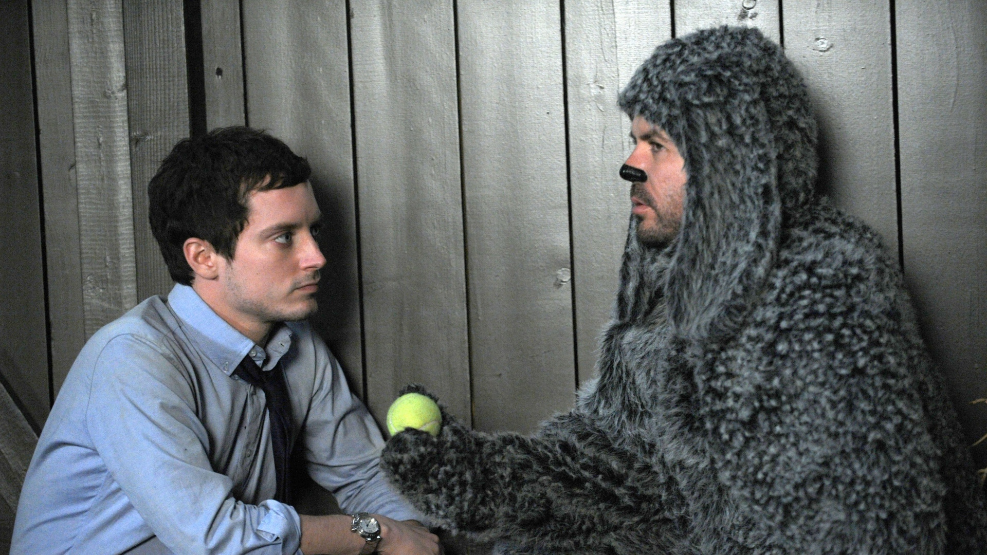 Elijah Wood and Jason Gann in a furry costume HD Wallpaper