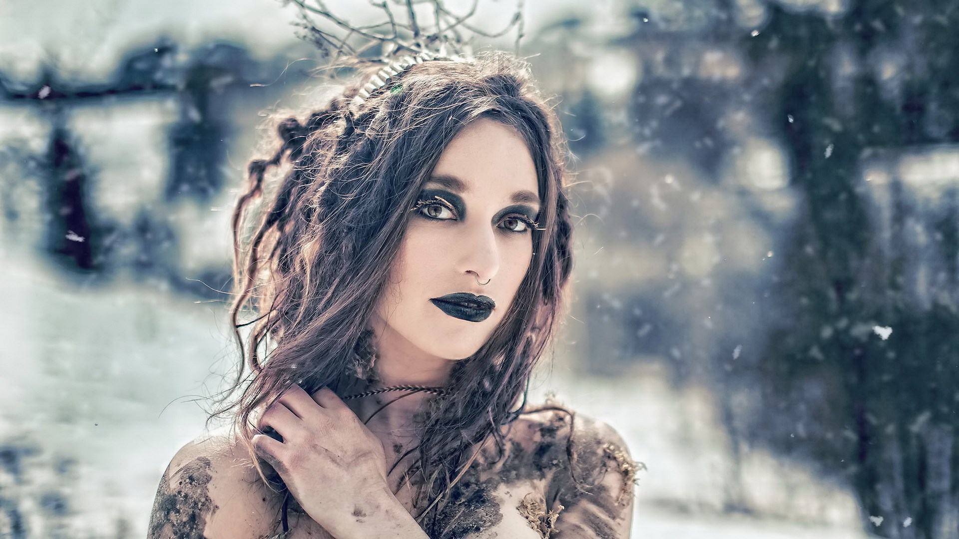 Woman with dark makeup and dreadlocks in winter HD Wallpaper