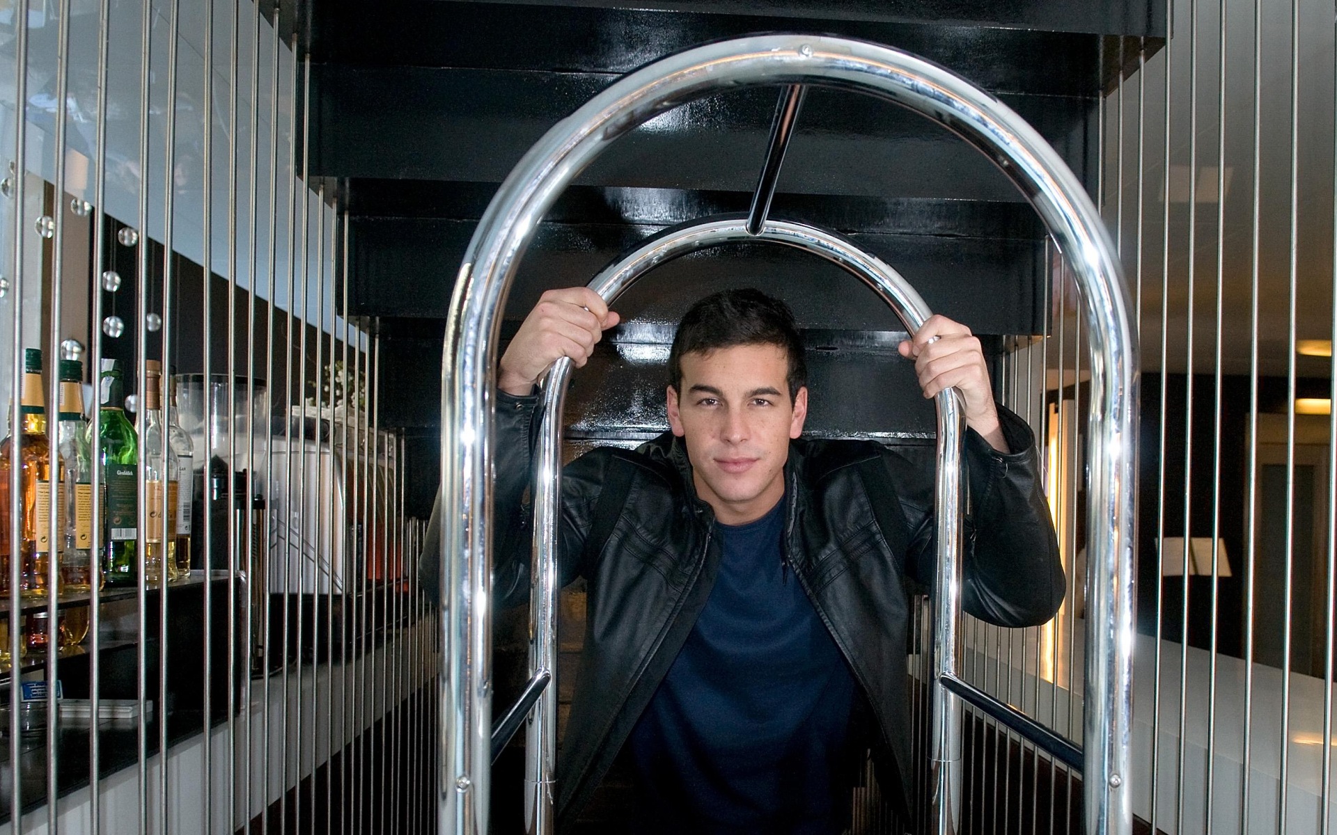 Mario Casas in a hotel lobby HD Wallpaper