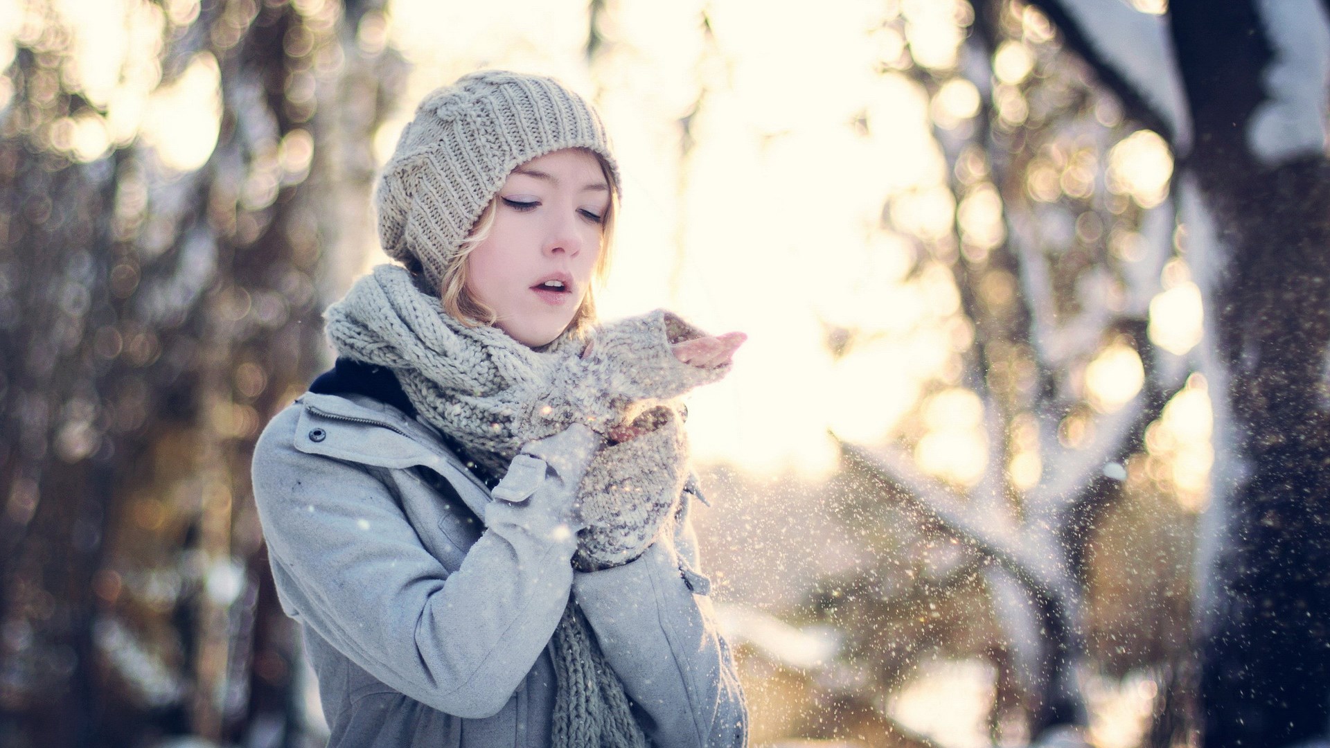 Girl blowing snow in a winter forest HD Wallpaper