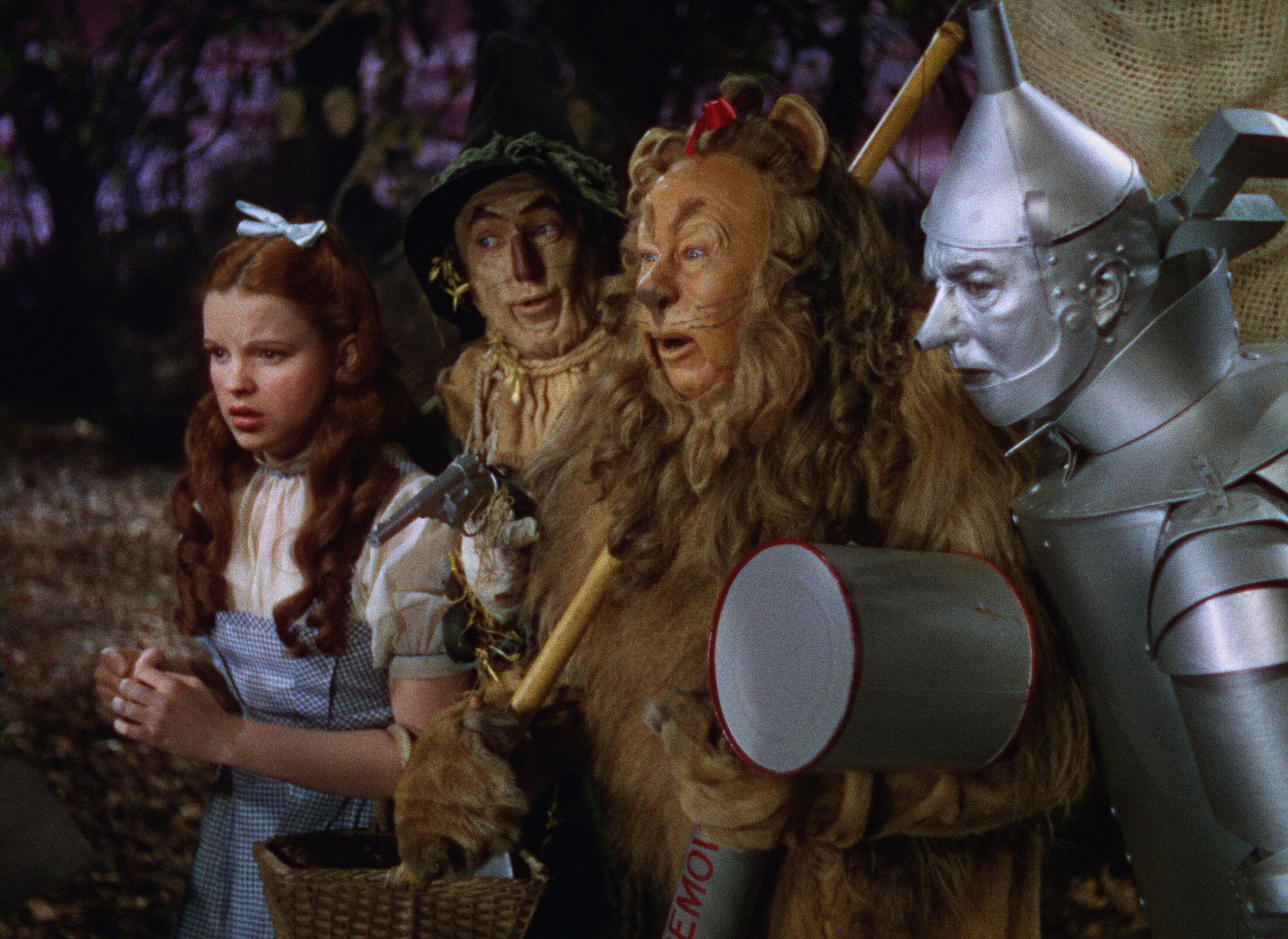 Dorothy, Scarecrow, Lion, and Tin Man in The Wizard of Oz HD Wallpaper