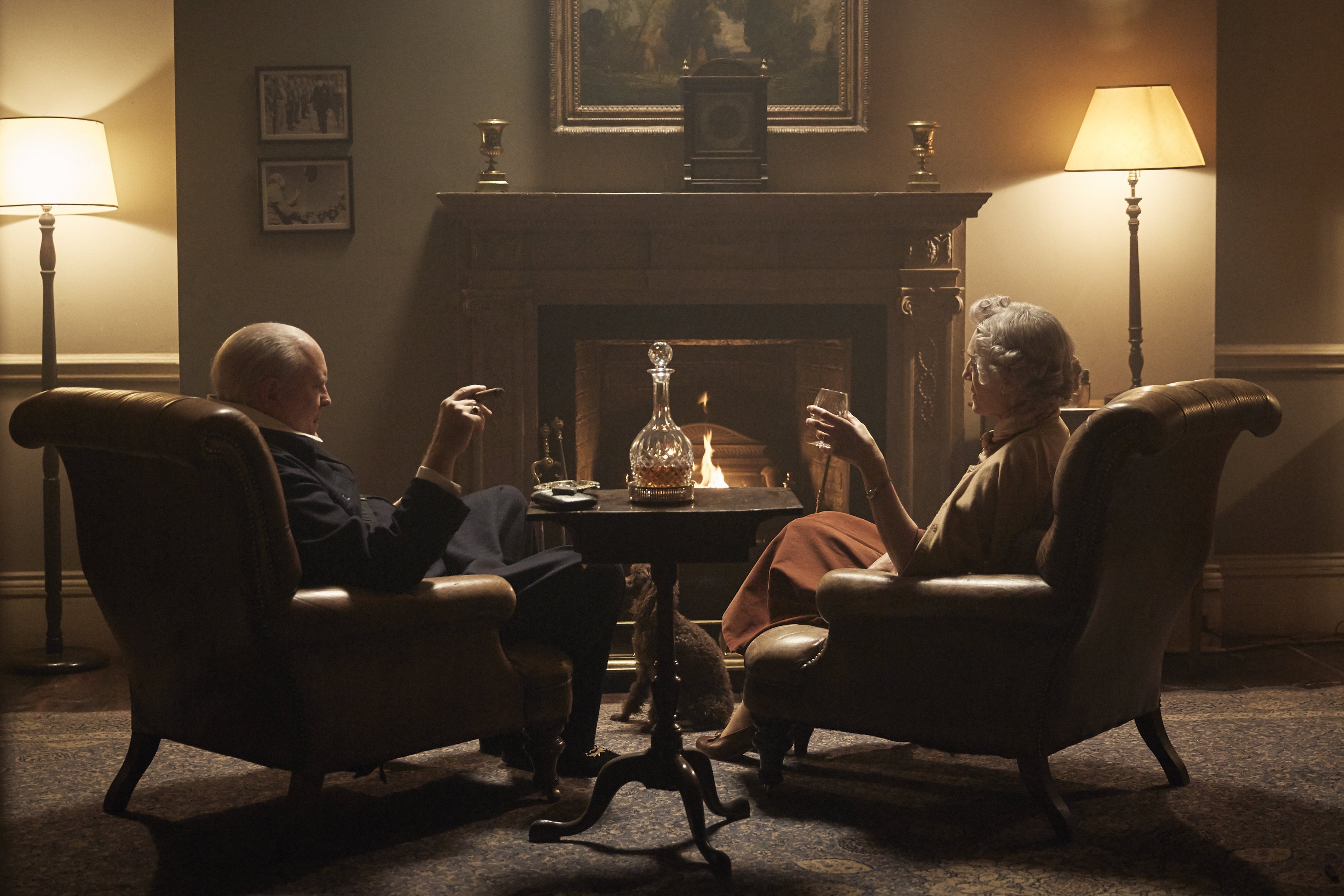 John Lithgow in a study with a fireplace HD Wallpaper