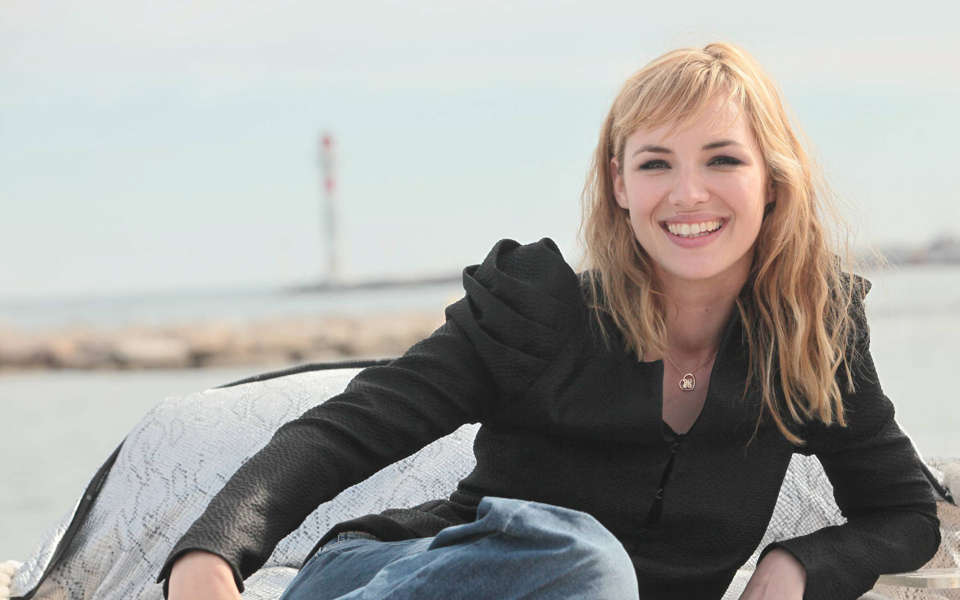 Louise Bourgoin smiling outdoors HD Wallpaper