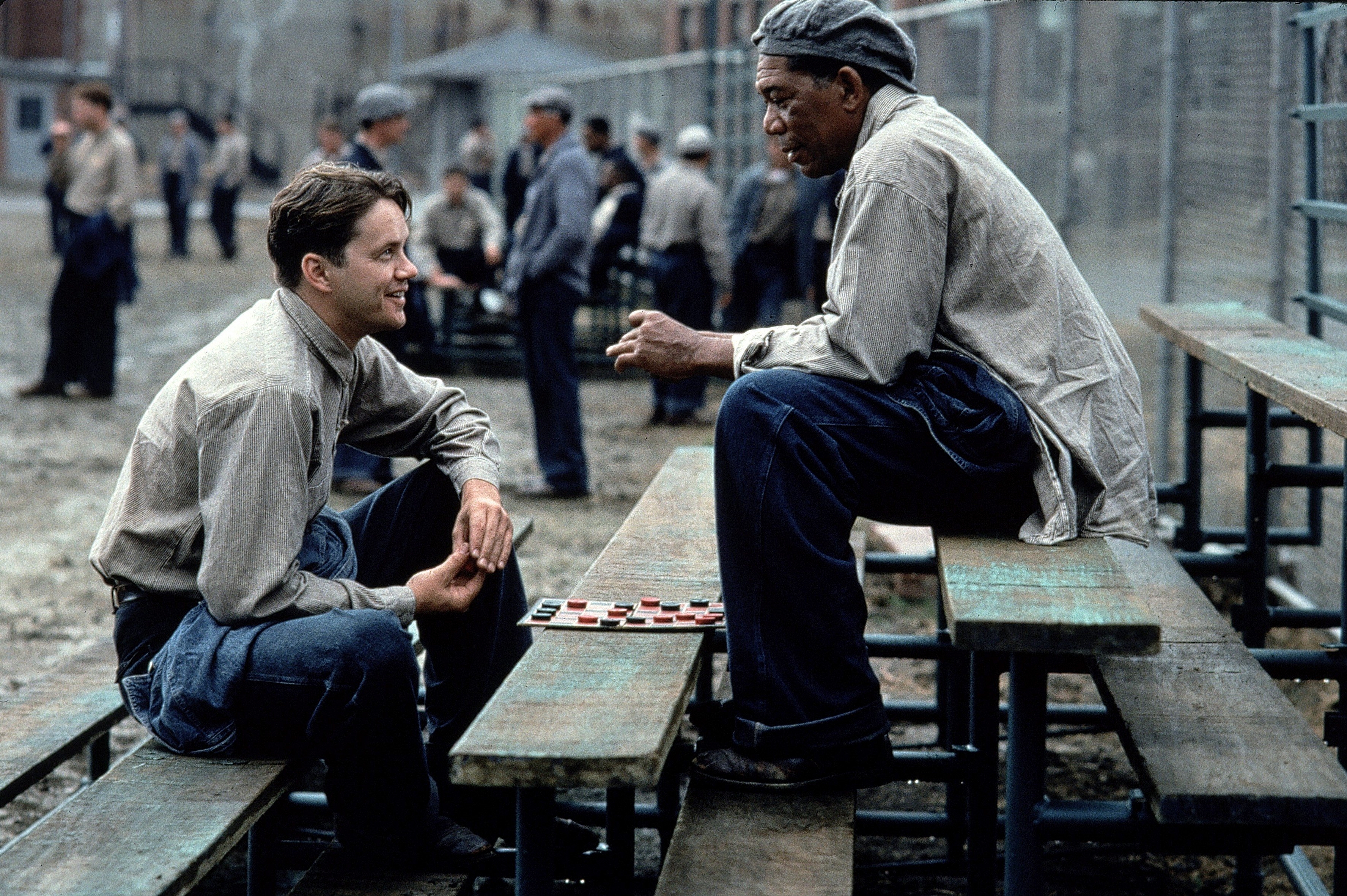 Andy Dufresne and Ellis 'Red' Redding playing checkers HD Wallpaper