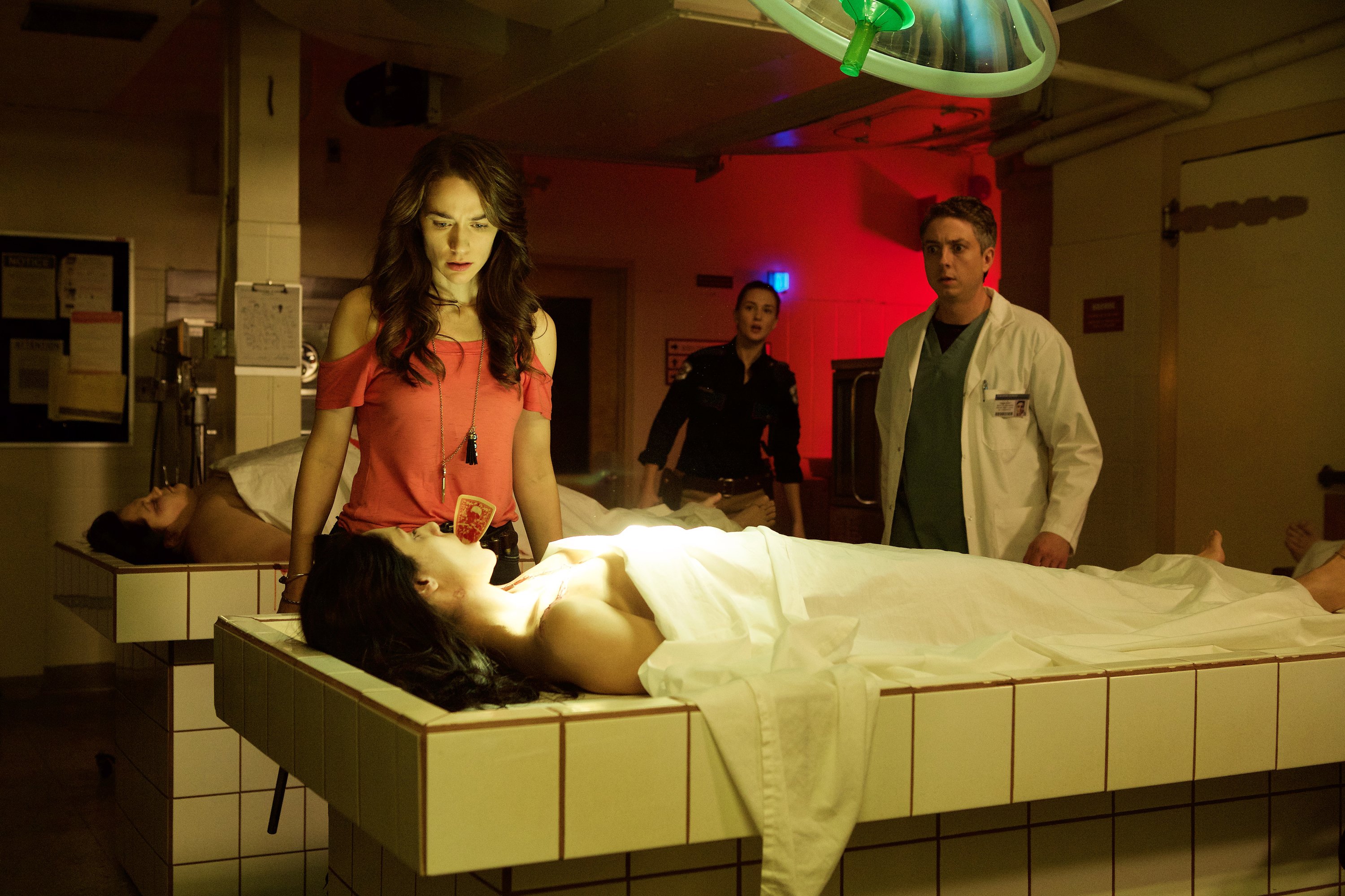 Tim Rozon and two women in a morgue HD Wallpaper