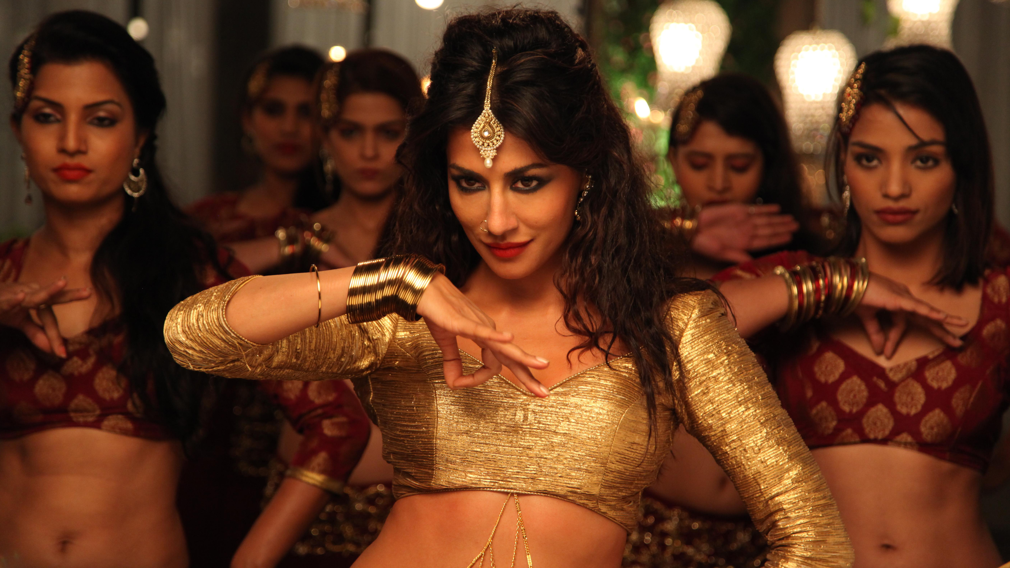 Chitrangada Singh dancing in a golden outfit HD Wallpaper