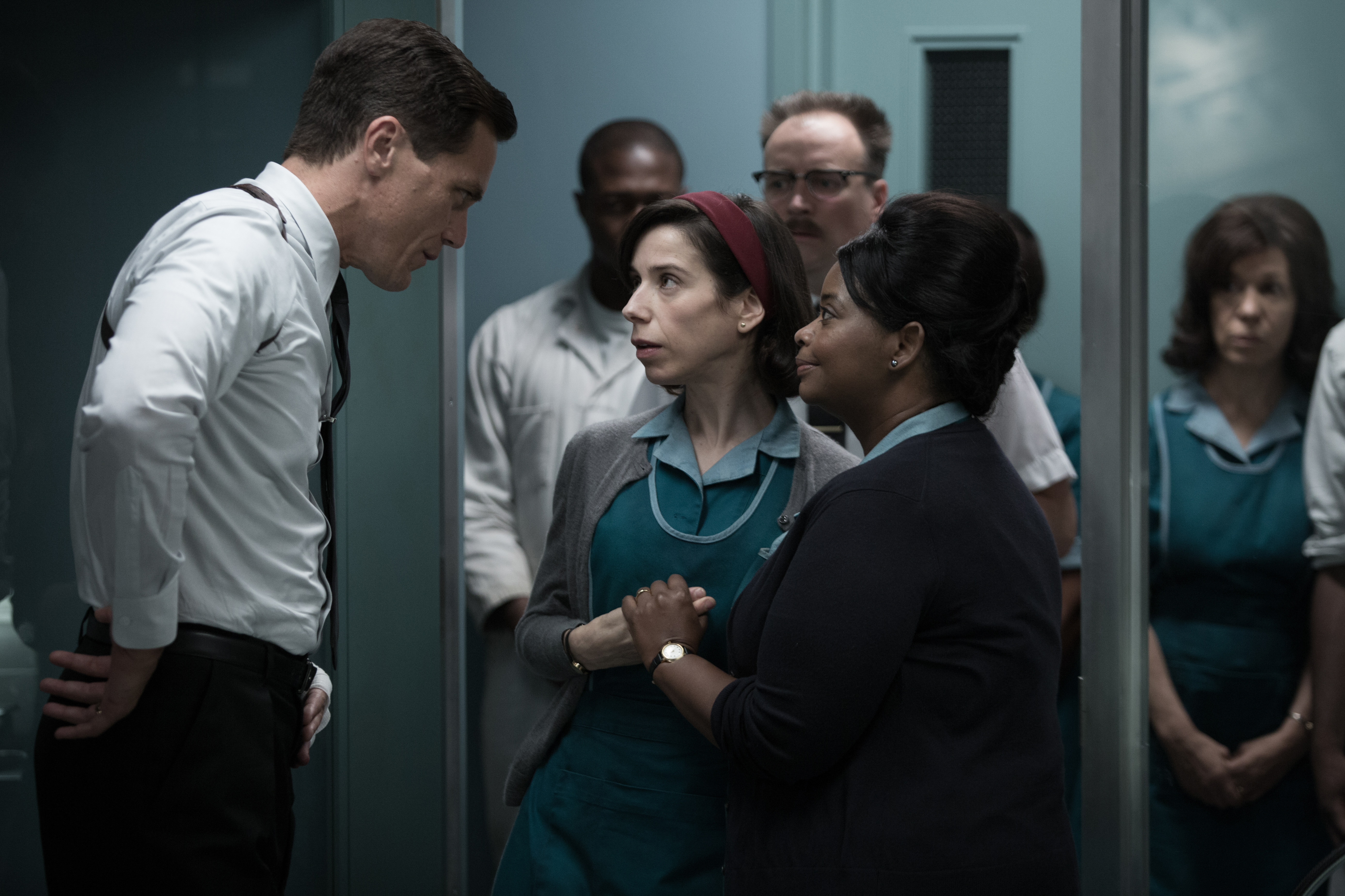 Octavia Spencer and colleagues in a hallway HD Wallpaper
