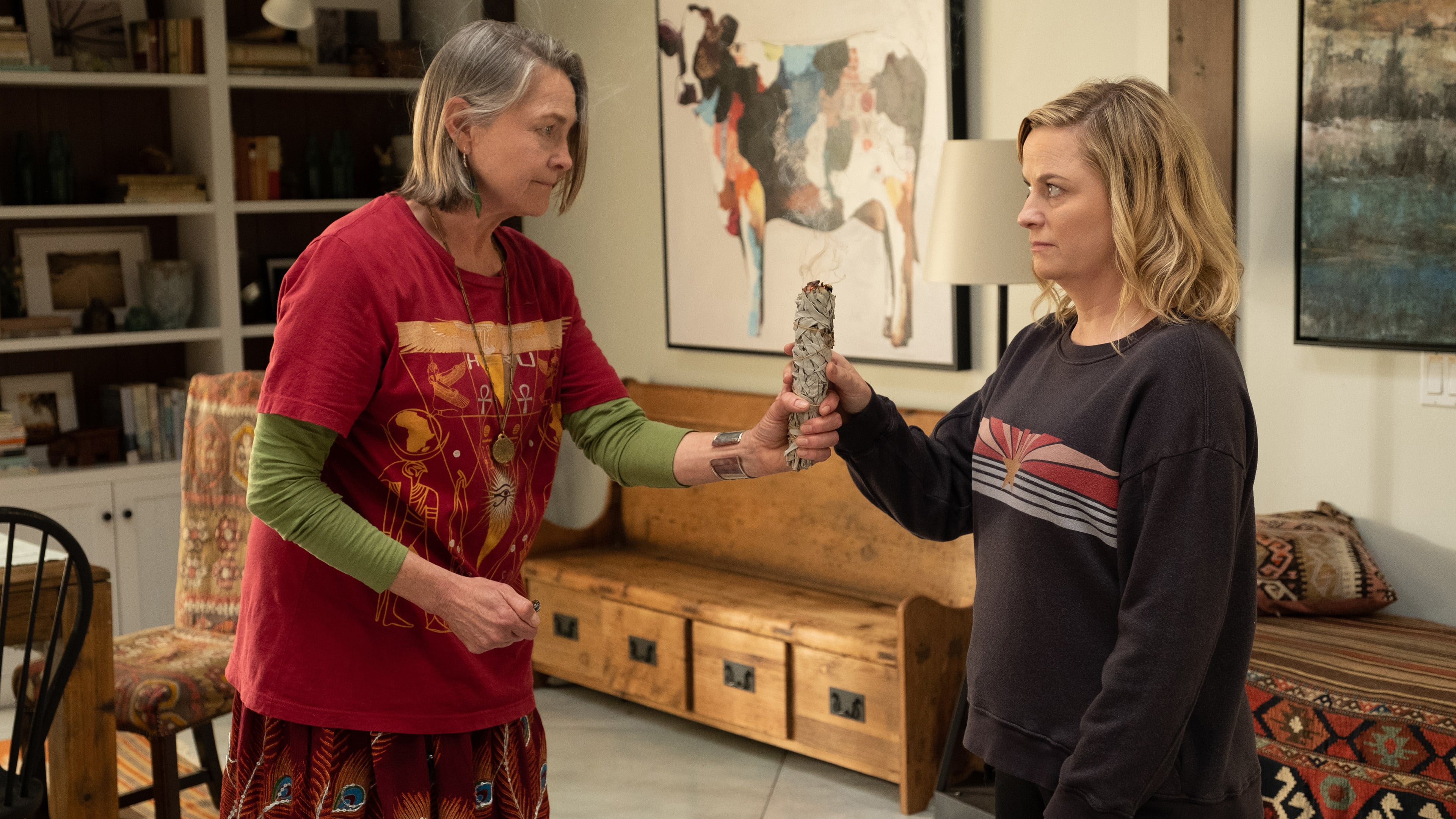Amy Poehler and older woman with sage stick HD Wallpaper