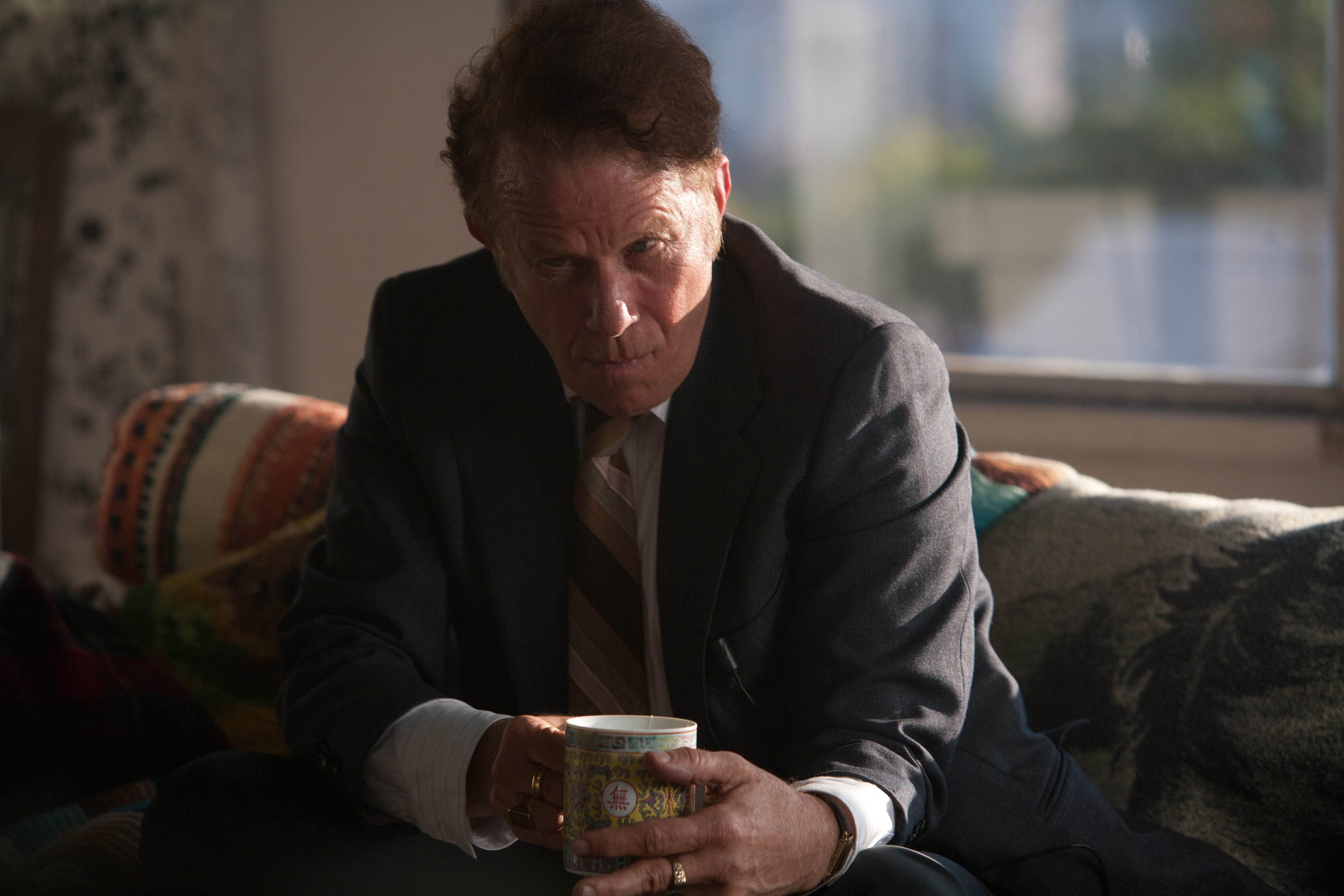 Tom Waits holding a mug HD Wallpaper