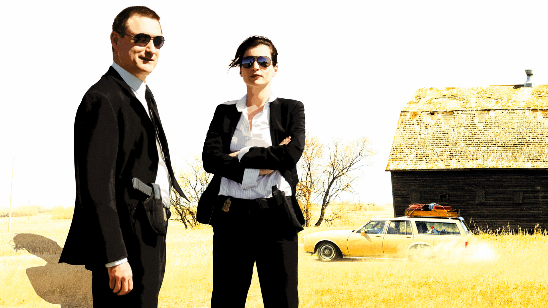 Bill Pullman and actress in suits with car and barn HD Wallpaper