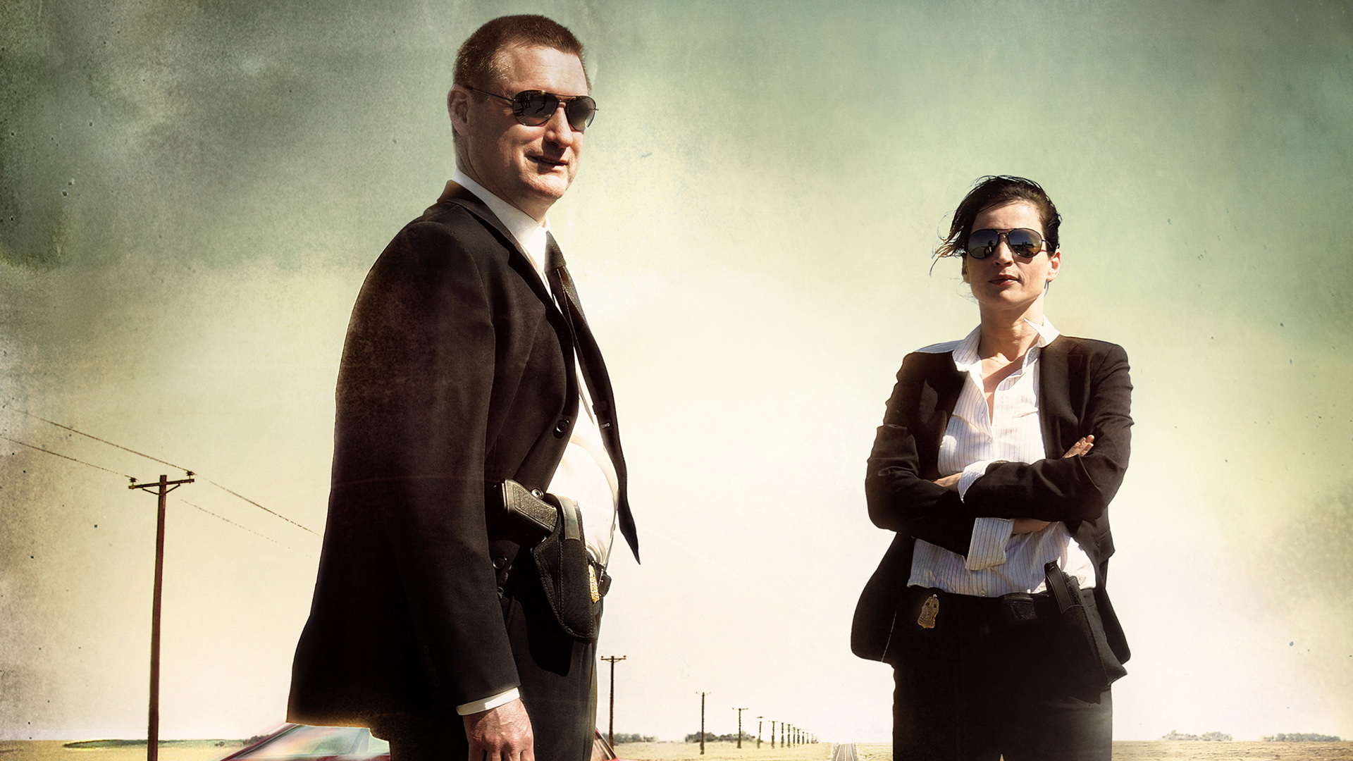 Bill Pullman and female detective on a road HD Wallpaper