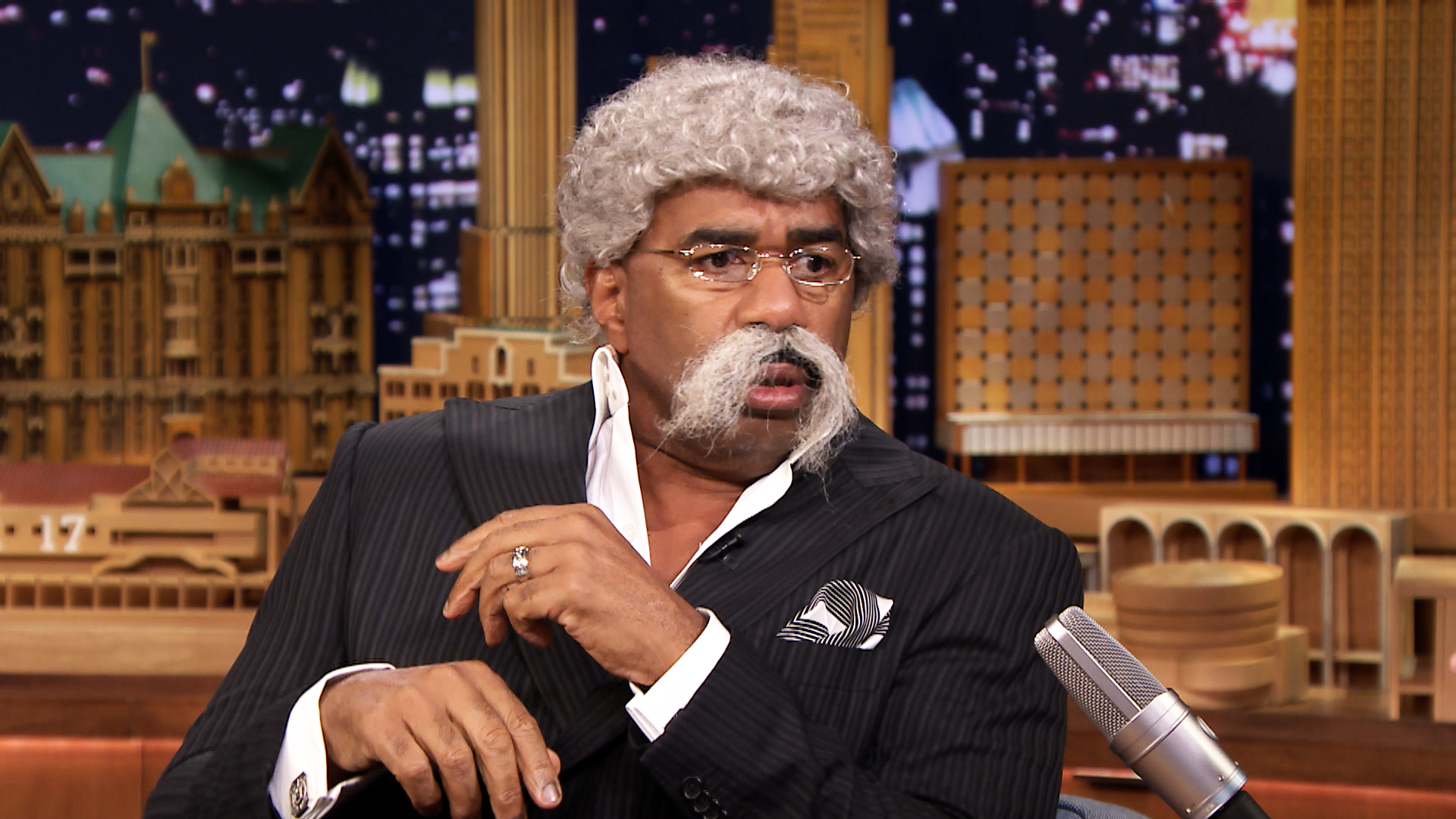 Steve Harvey in a wig and mustache HD Wallpaper