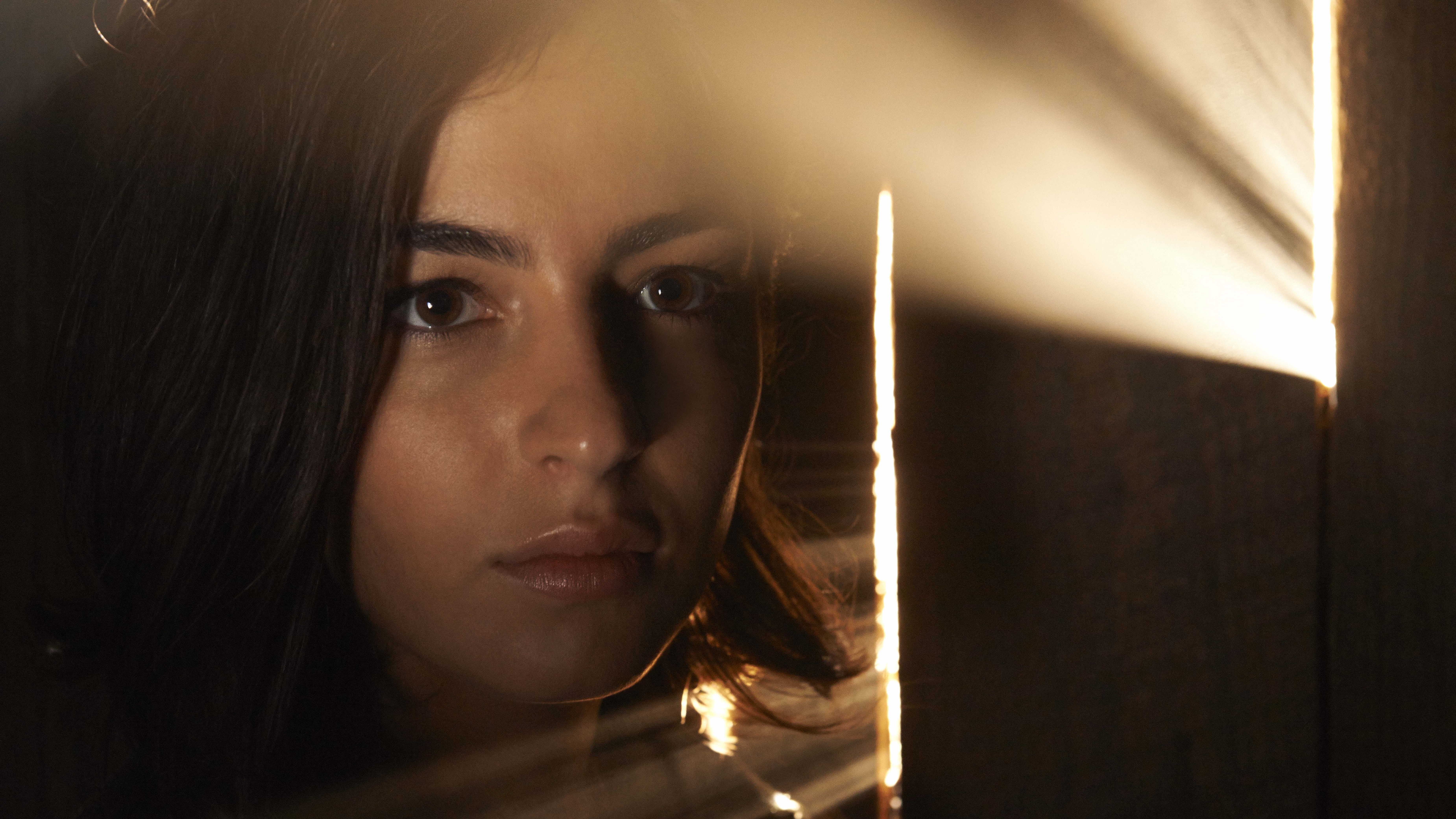 Alanna Masterson in dramatic lighting HD Wallpaper