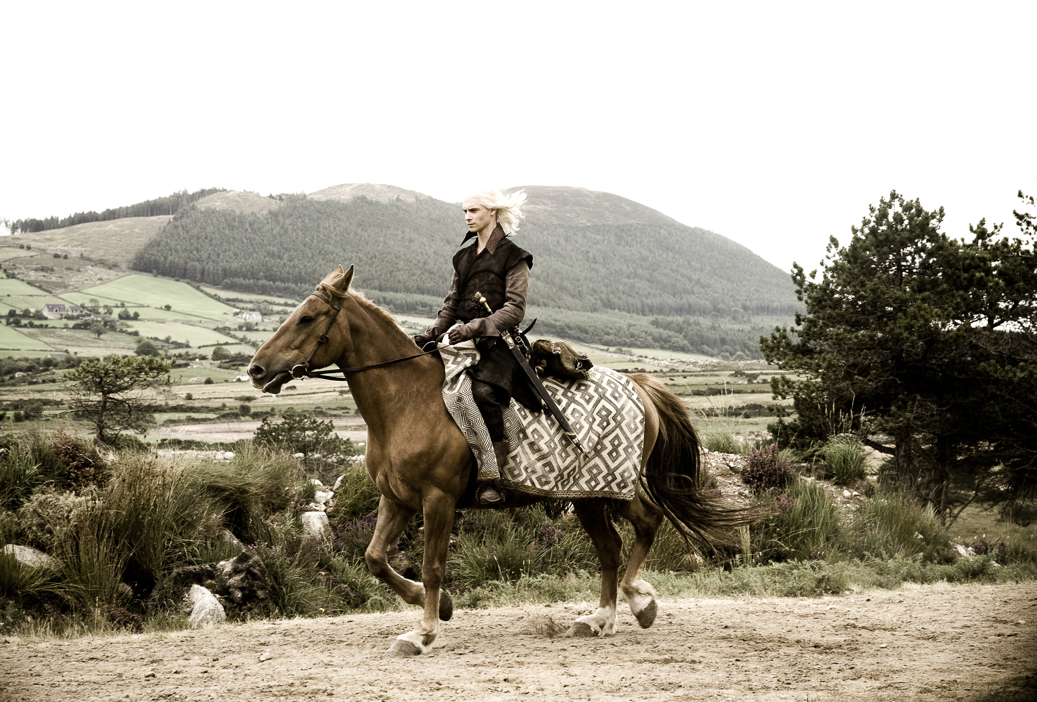 Harry Lloyd on horseback in a landscape HD Wallpaper
