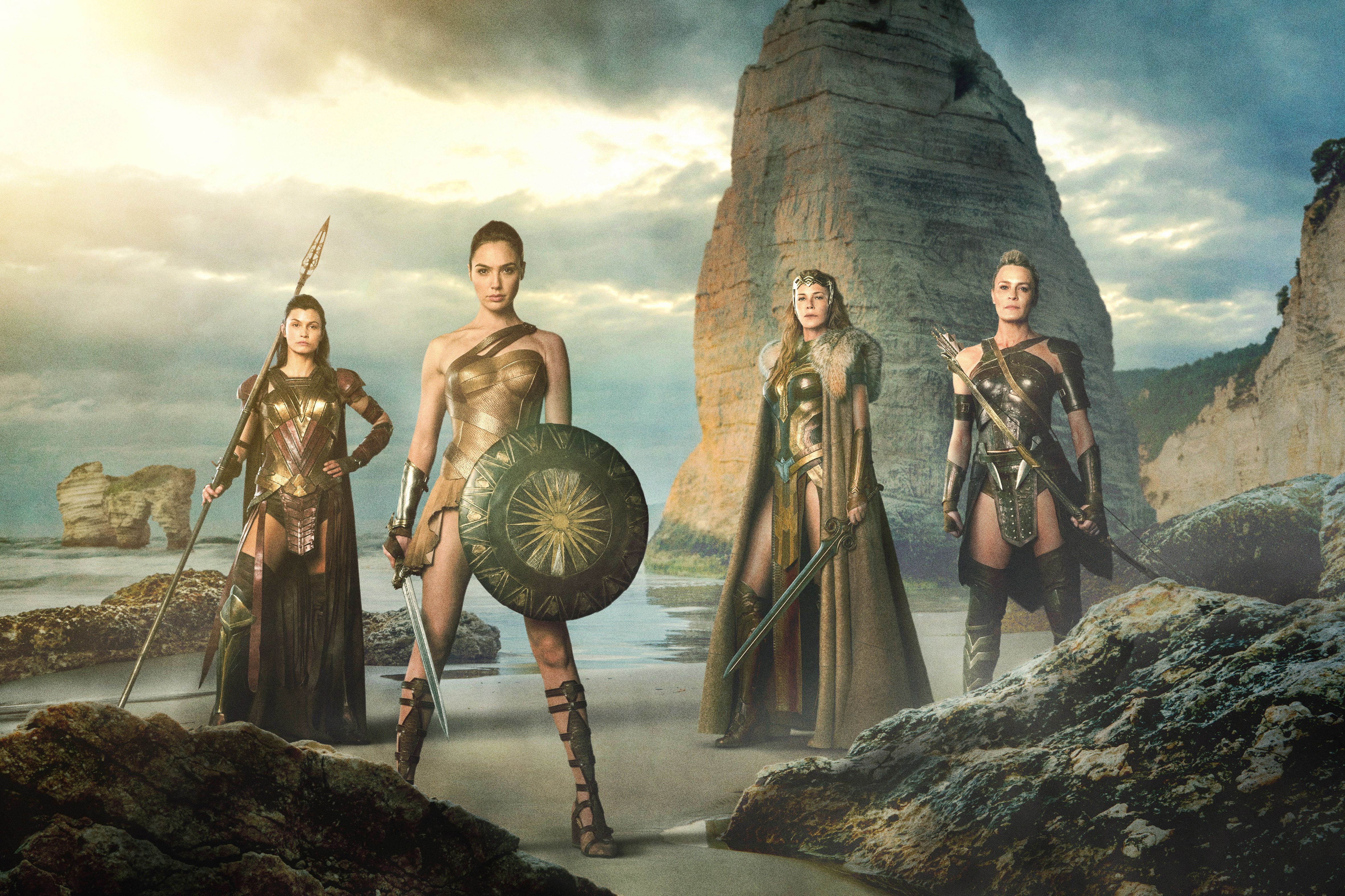 Wonder Woman and Amazon warriors on a beach HD Wallpaper