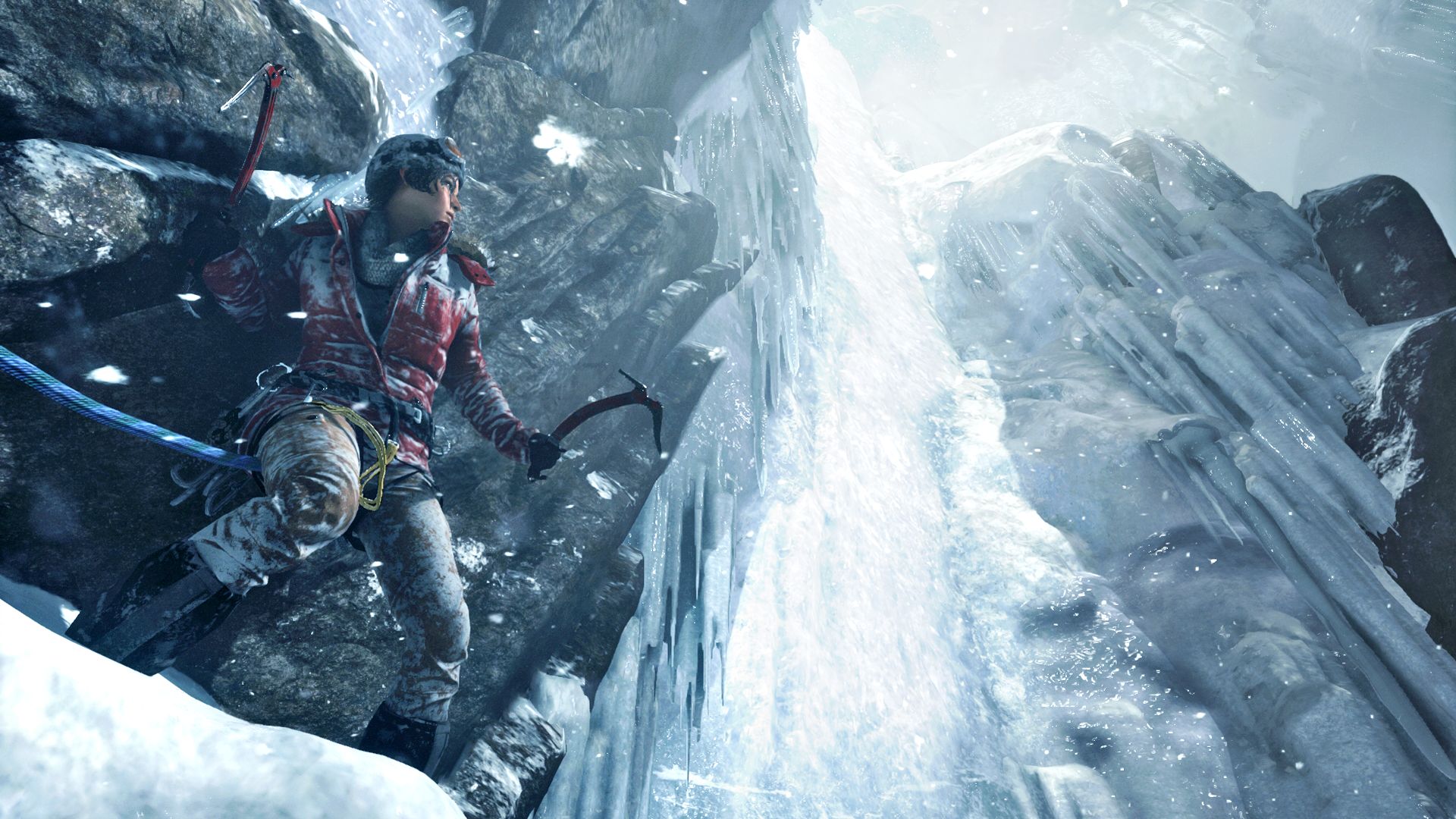 Lara Croft climbing an icy mountain HD Wallpaper