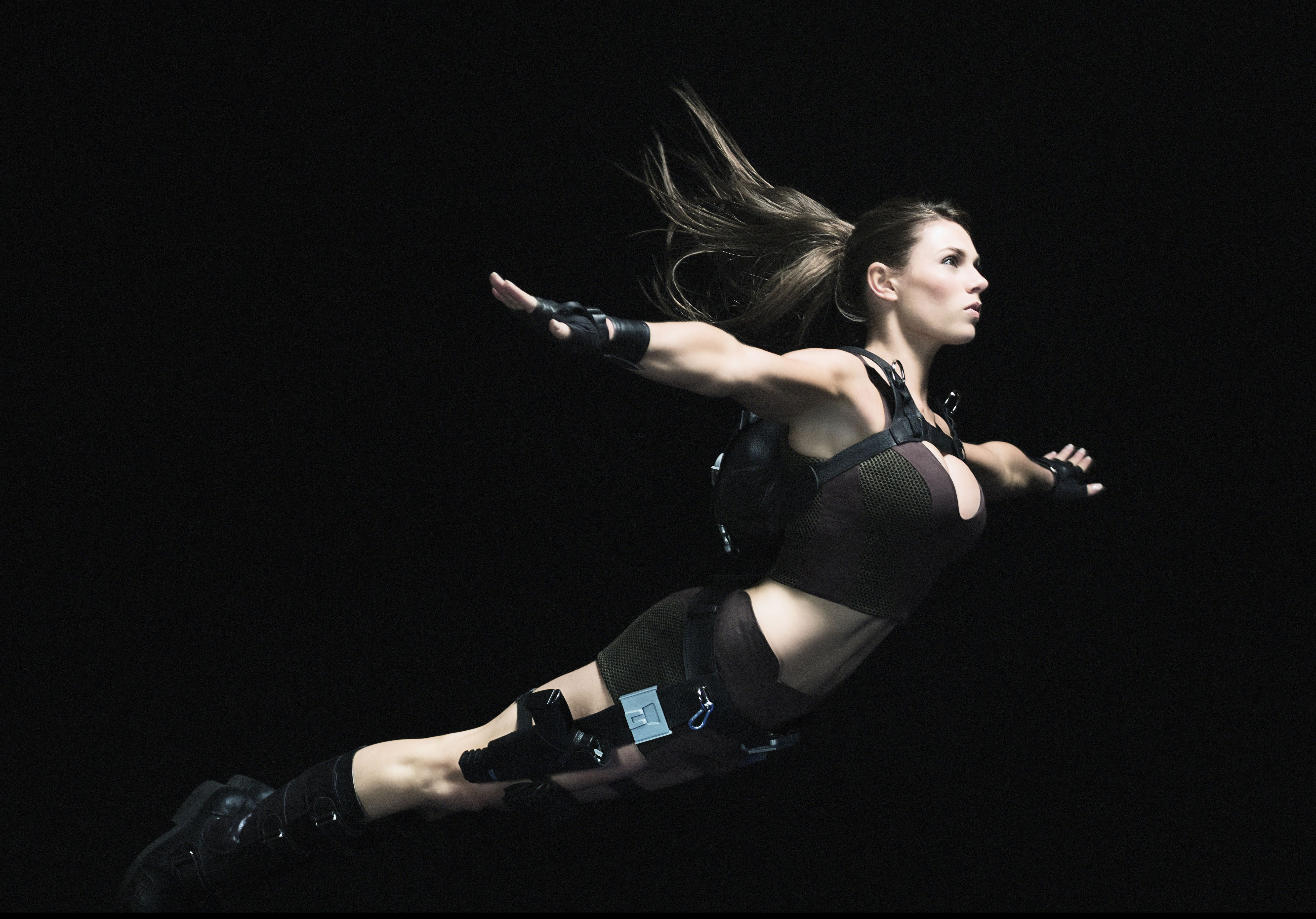 Lara Croft in action pose HD Wallpaper