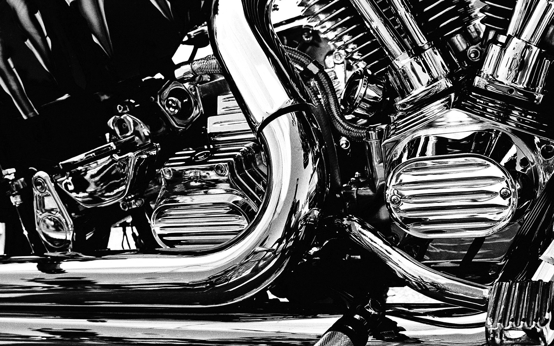 Close-up of a chrome motorcycle engine HD Wallpaper
