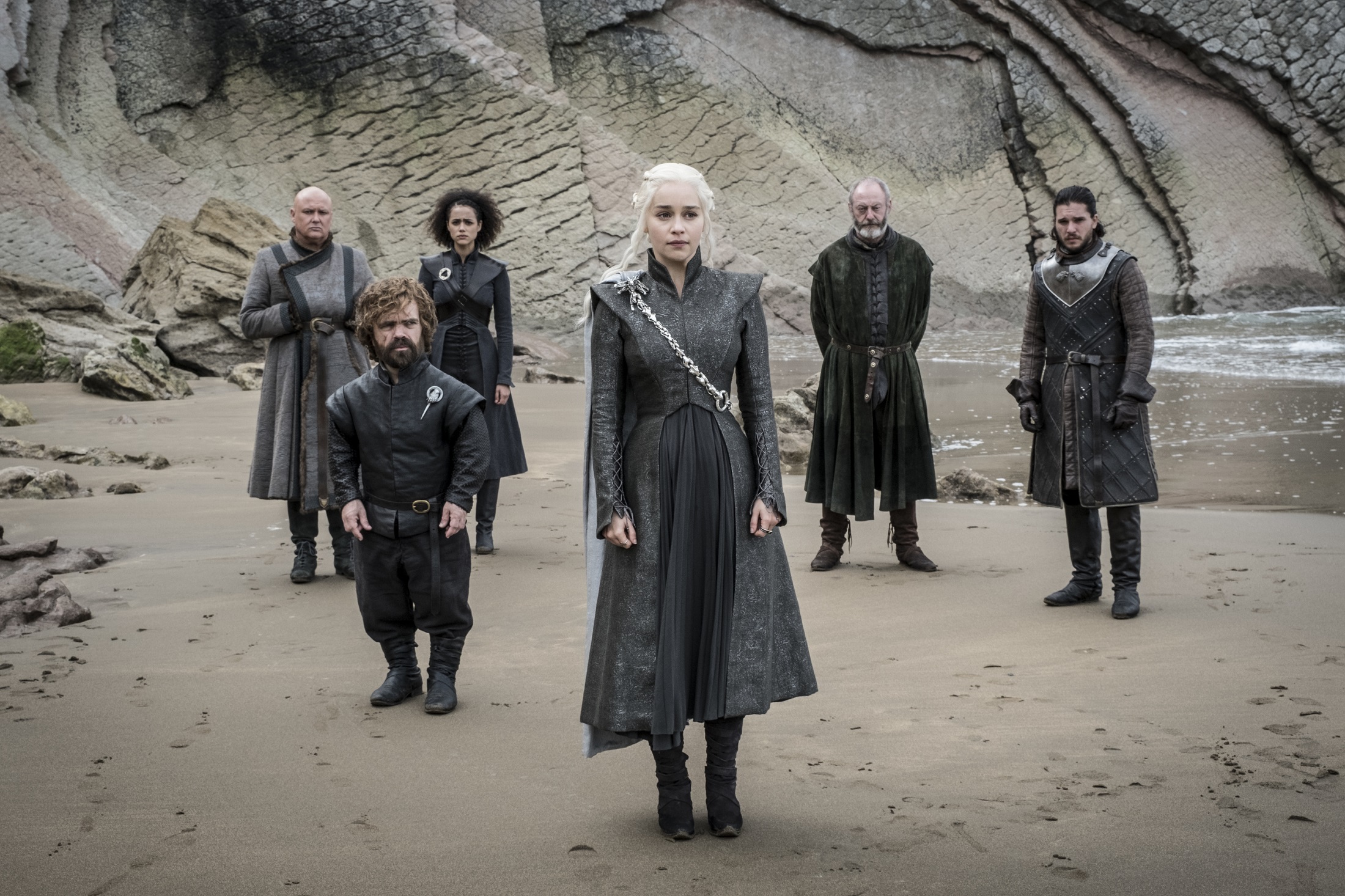 Tyrion Lannister and companions on a beach HD Wallpaper